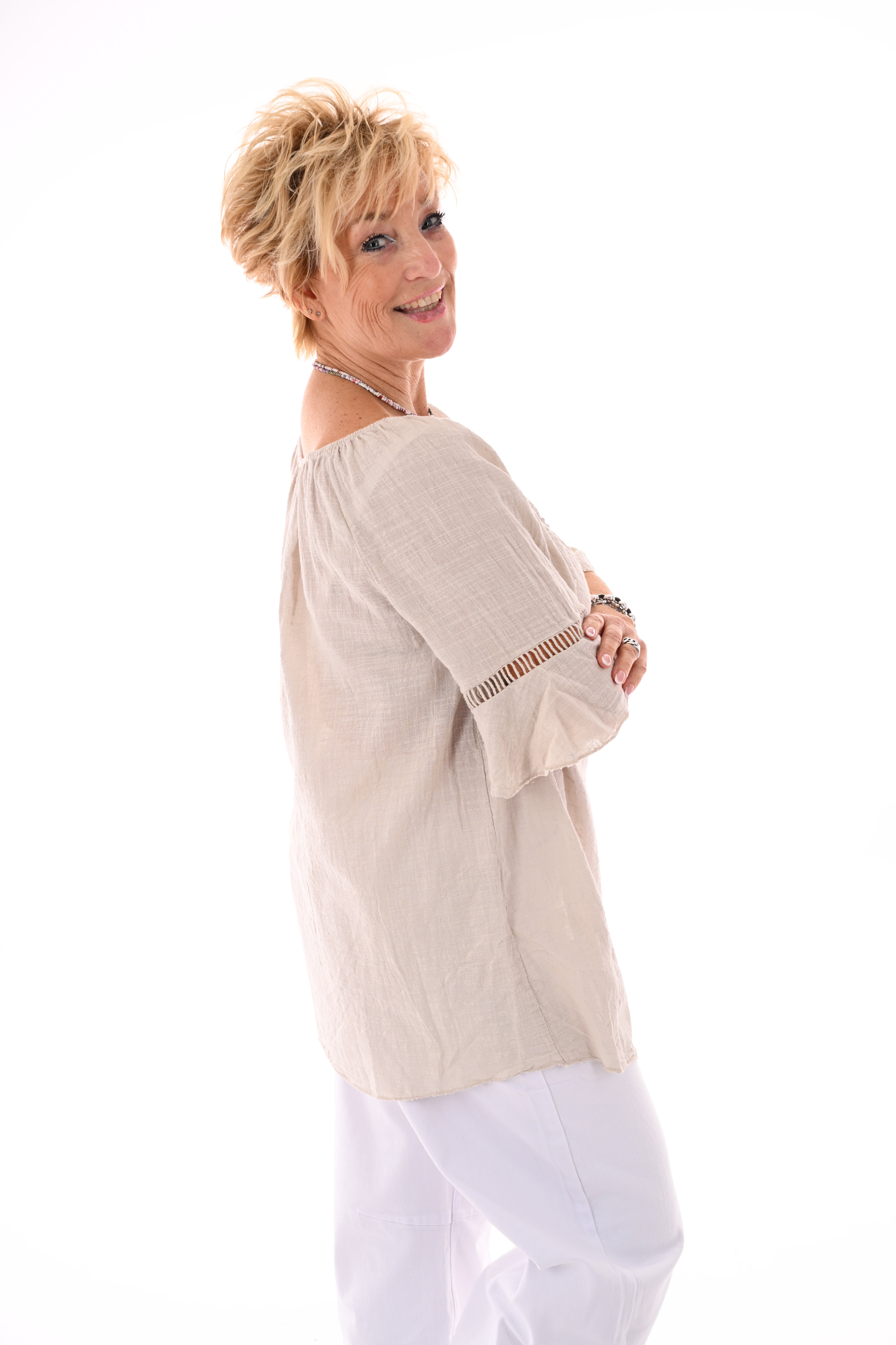 Top ibiza met kwastjes beige