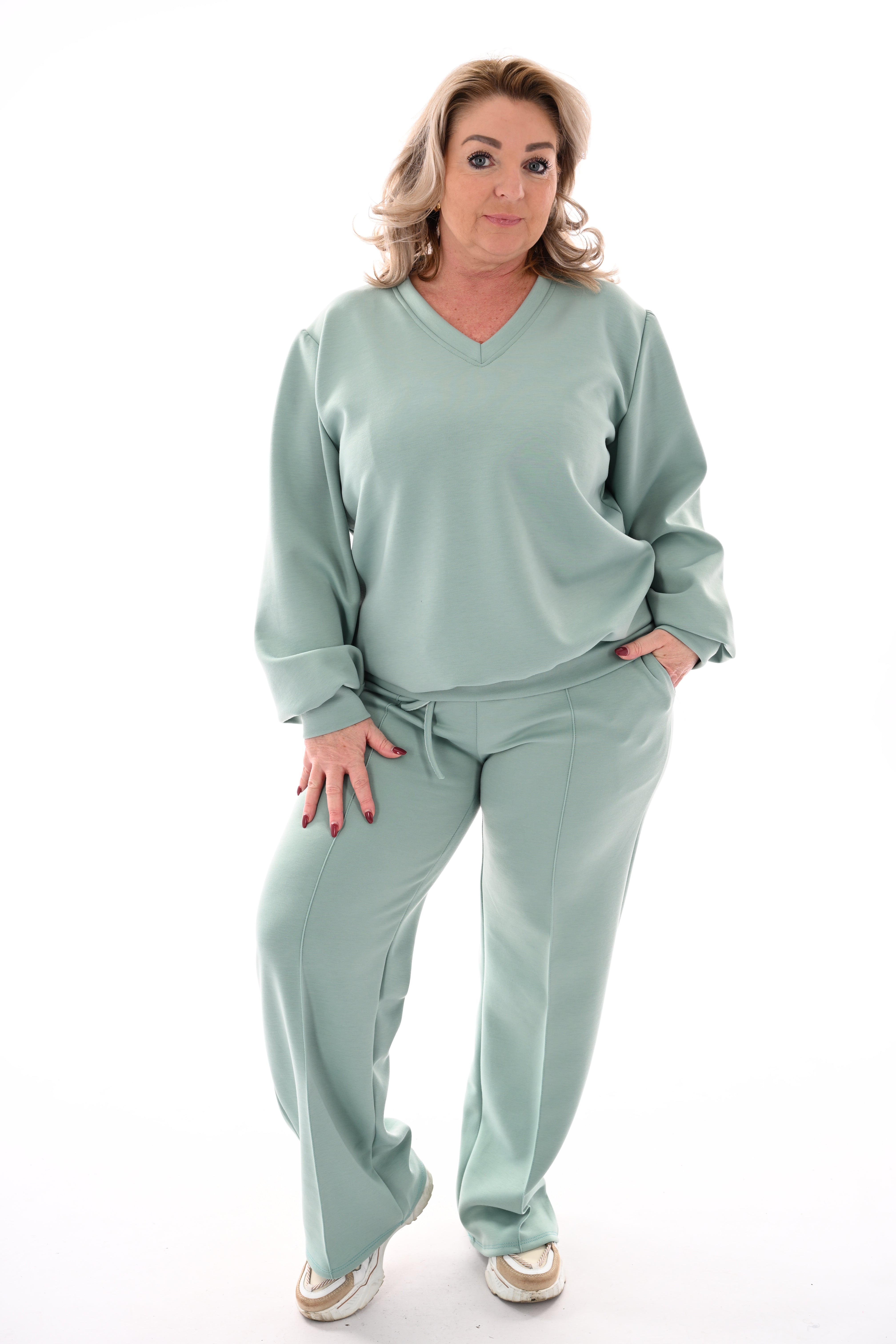 Tweedelig pak v-hals met boord uni lindegroen