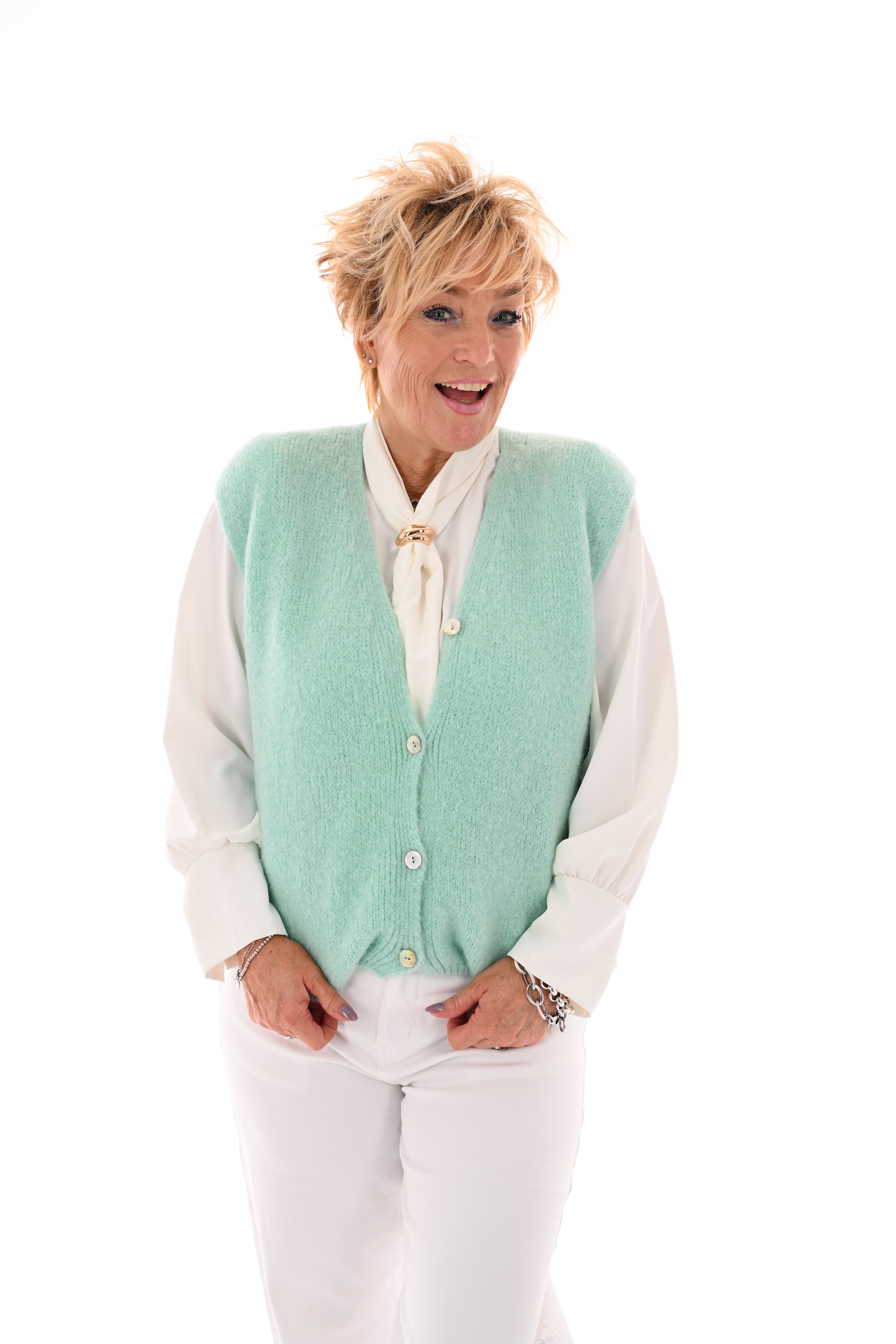 Fijn gebreid gilet met knopen turquoise