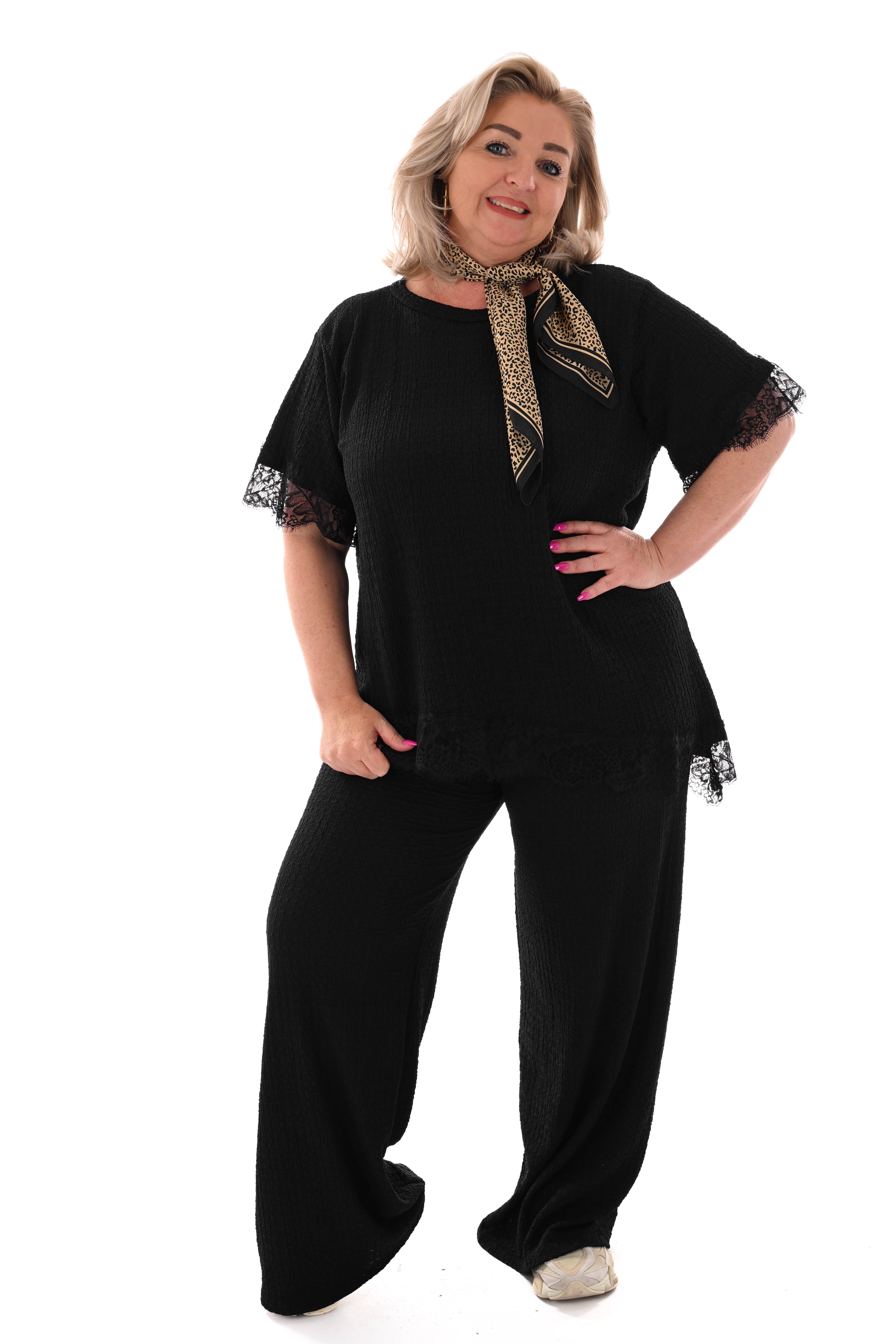 Tweedelig crepe set asymmetrisch zwart