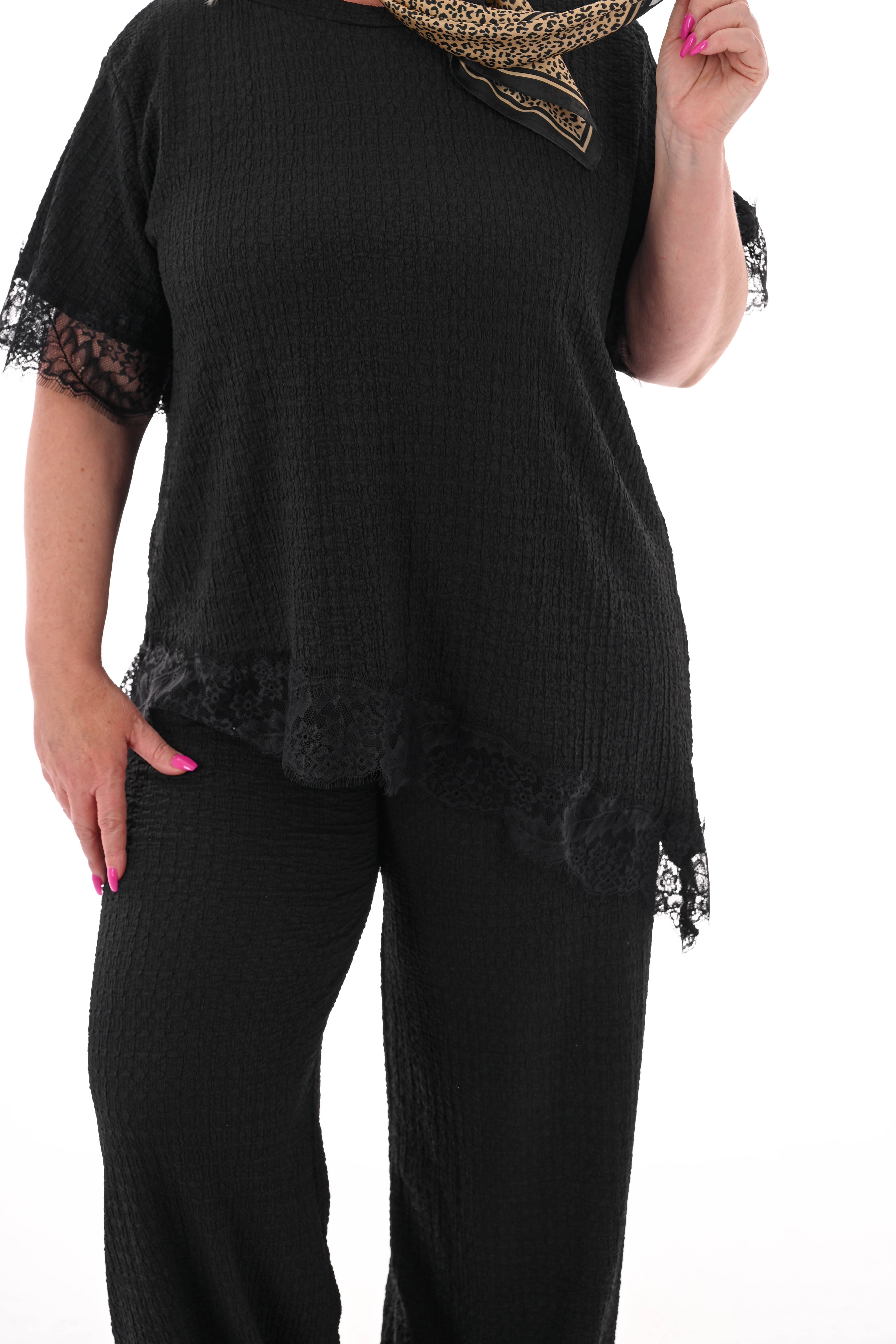 Tweedelig crepe set asymmetrisch zwart