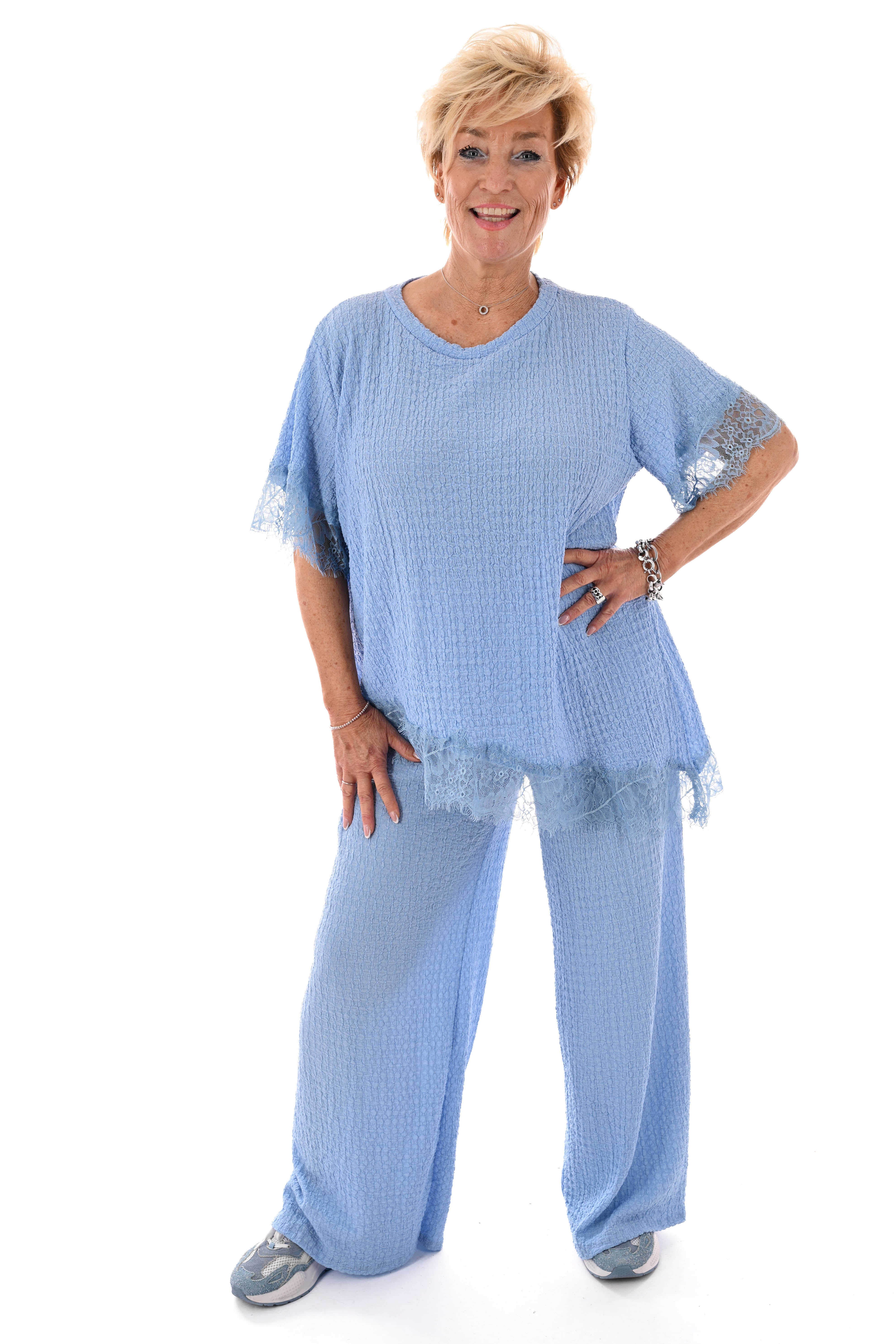 Tweedelig crepe set asymmetrisch lichtblauw