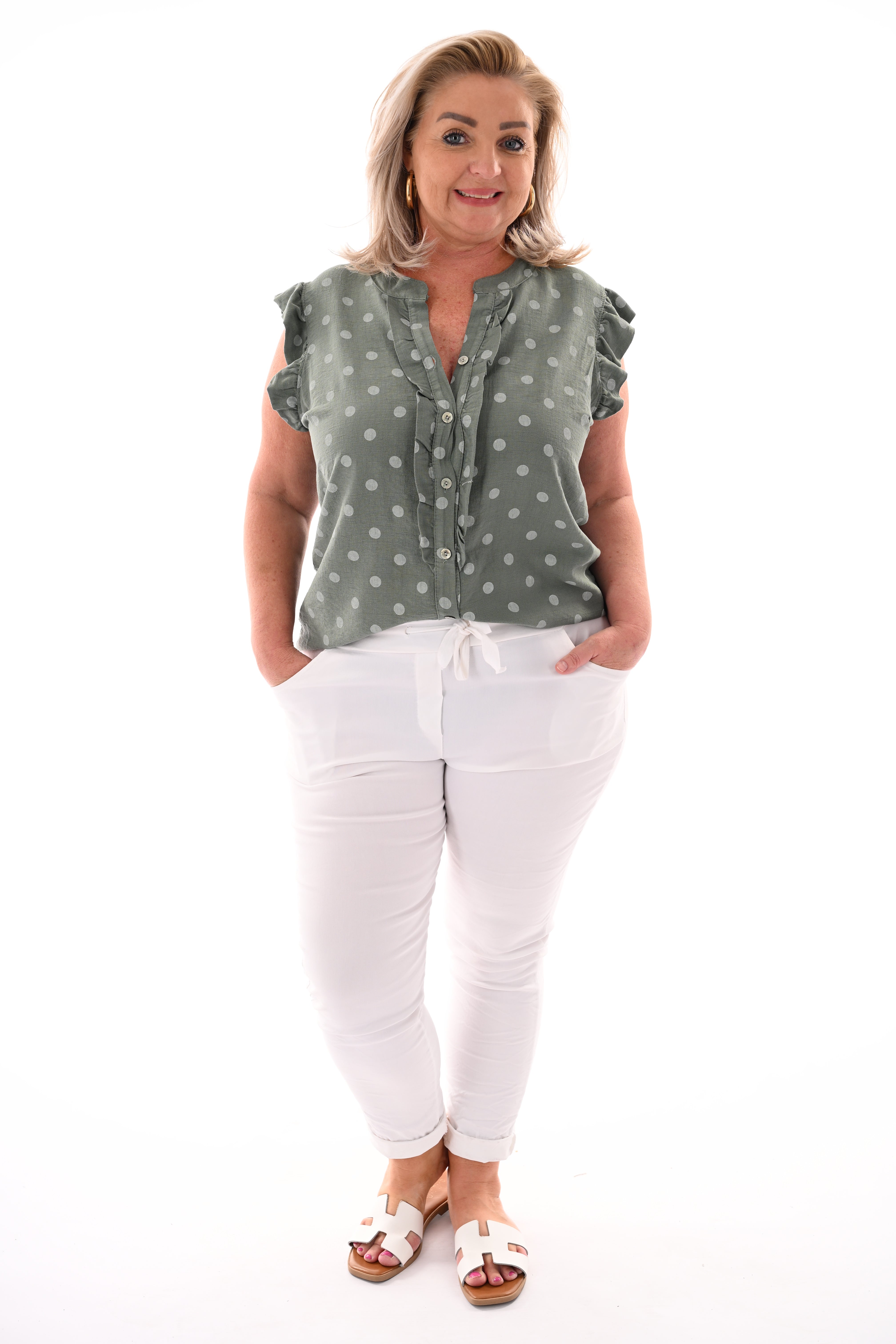 Dots blouse mouwloos met roezels lindegroen