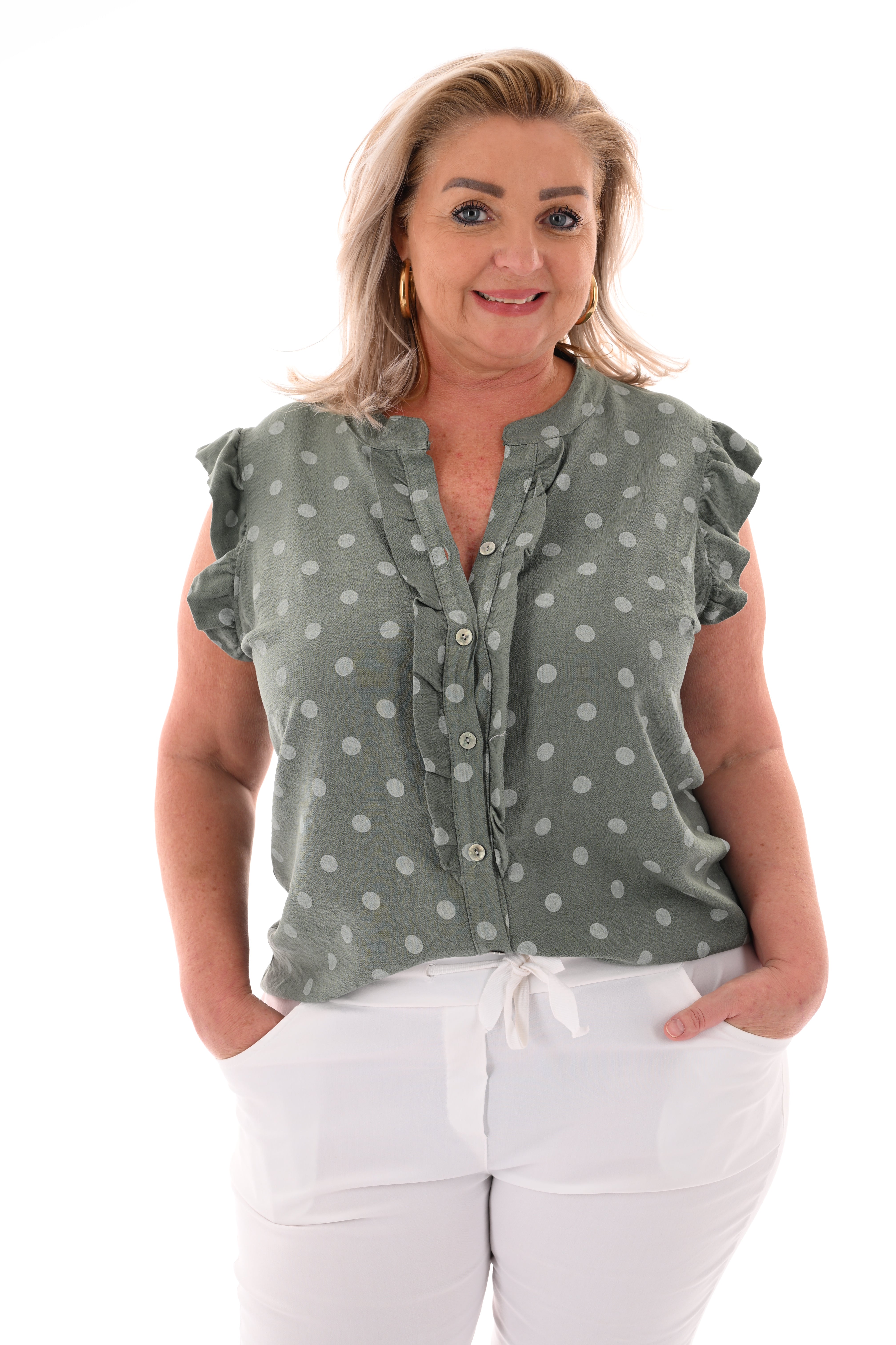 Dots blouse mouwloos met roezels lindegroen
