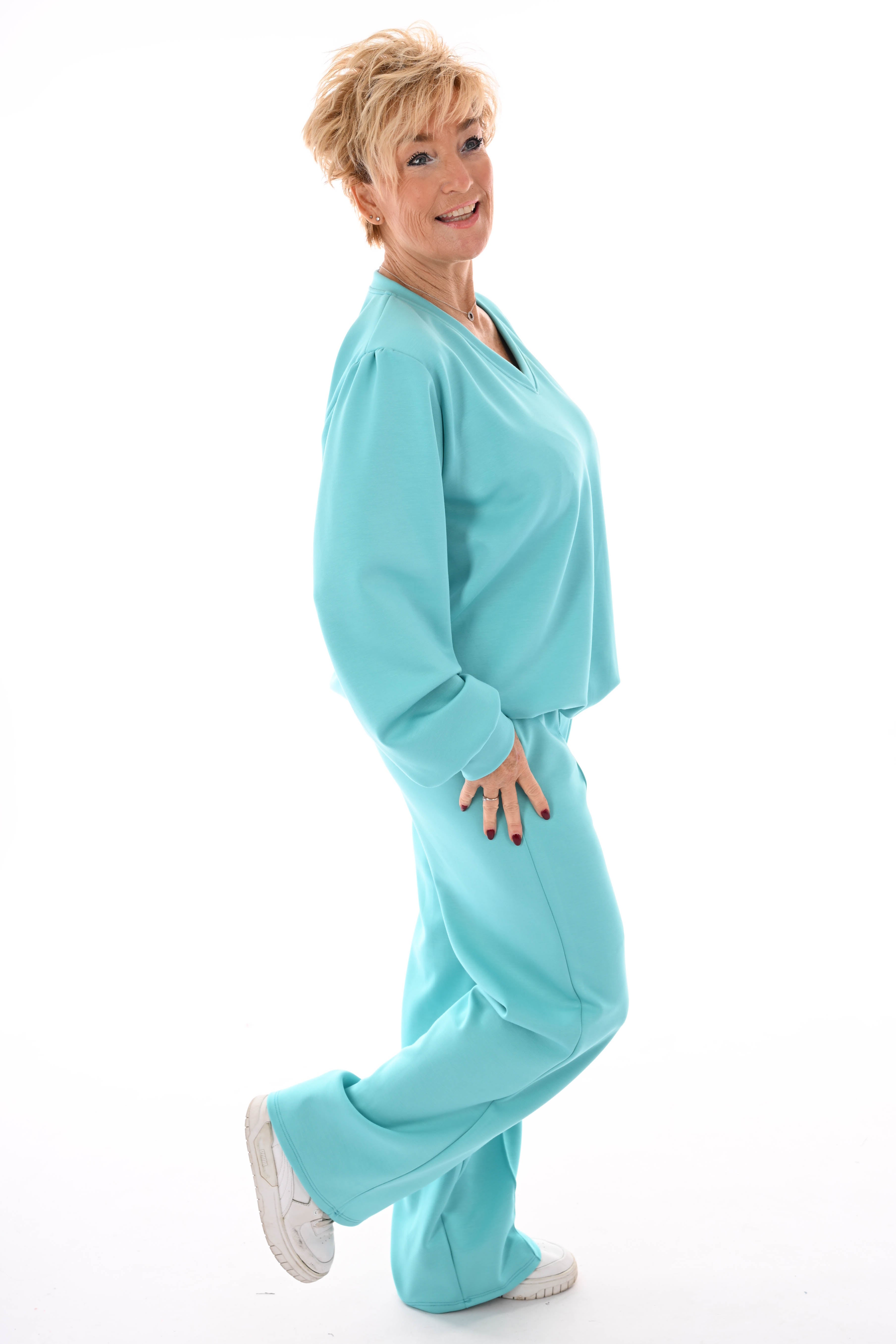 Tweedelig pak v-hals met boord uni aqua