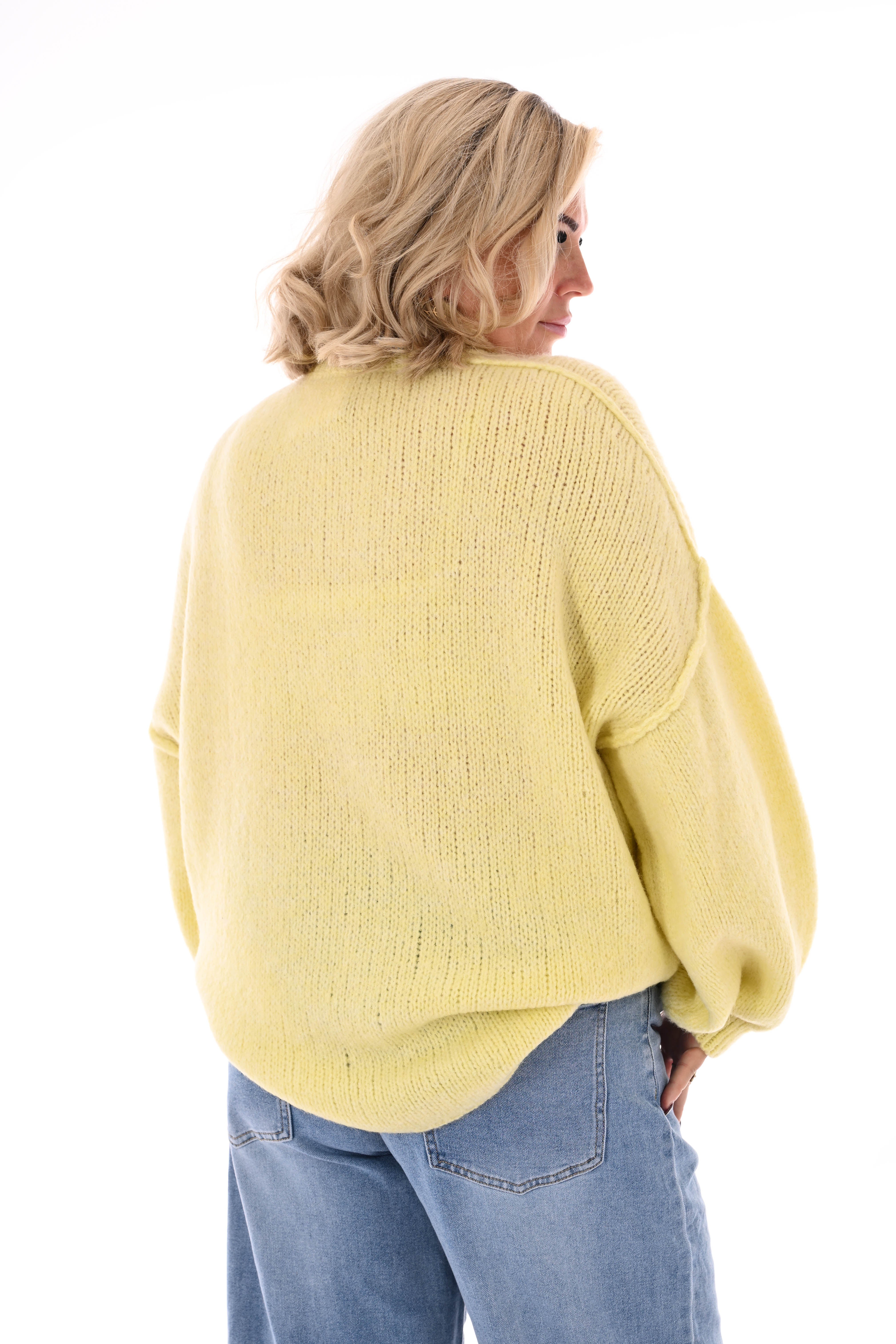 Gebreide trui turtle neck met pofmouwen lichtgeel