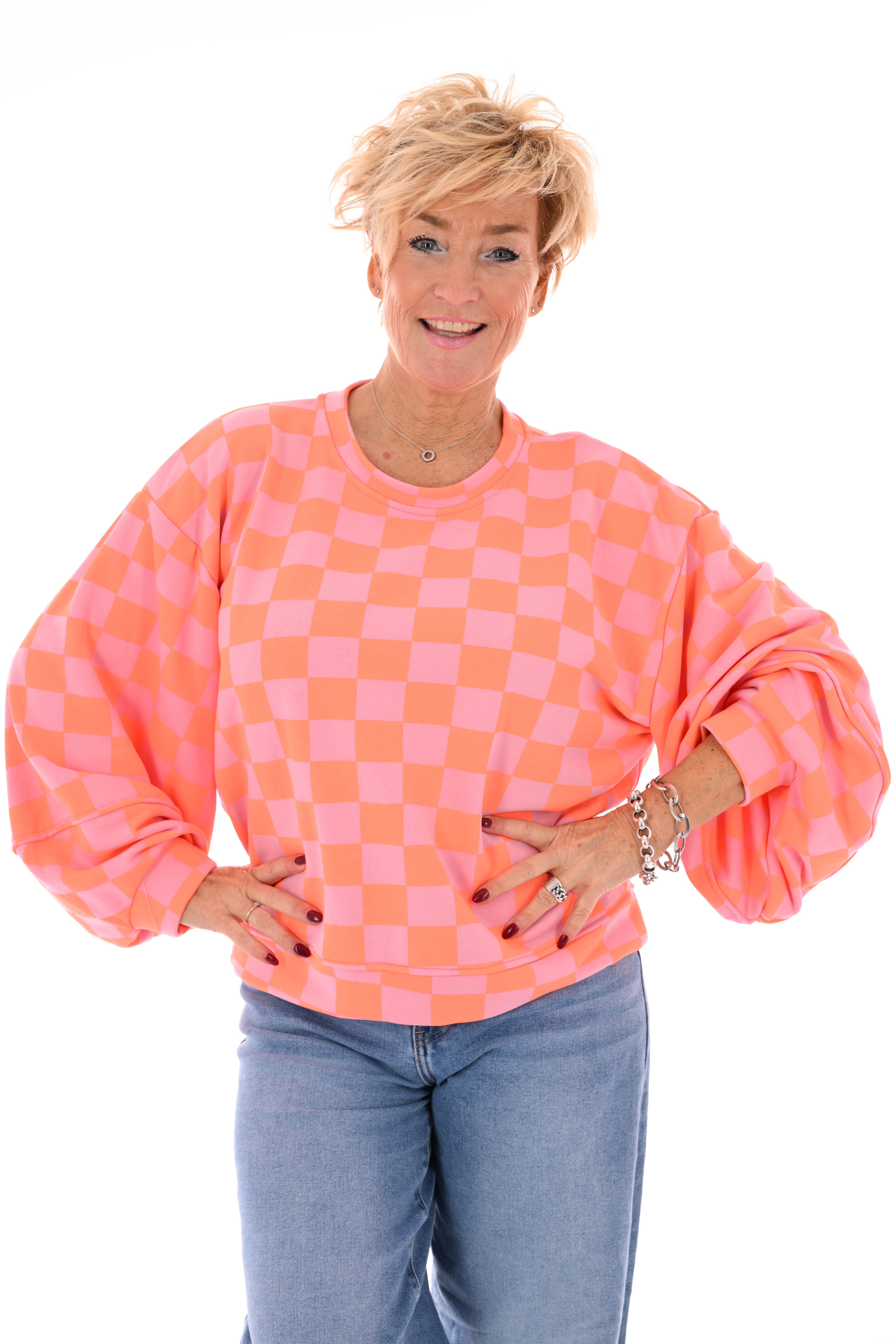 Geblokte sweater lichtroze/oranje