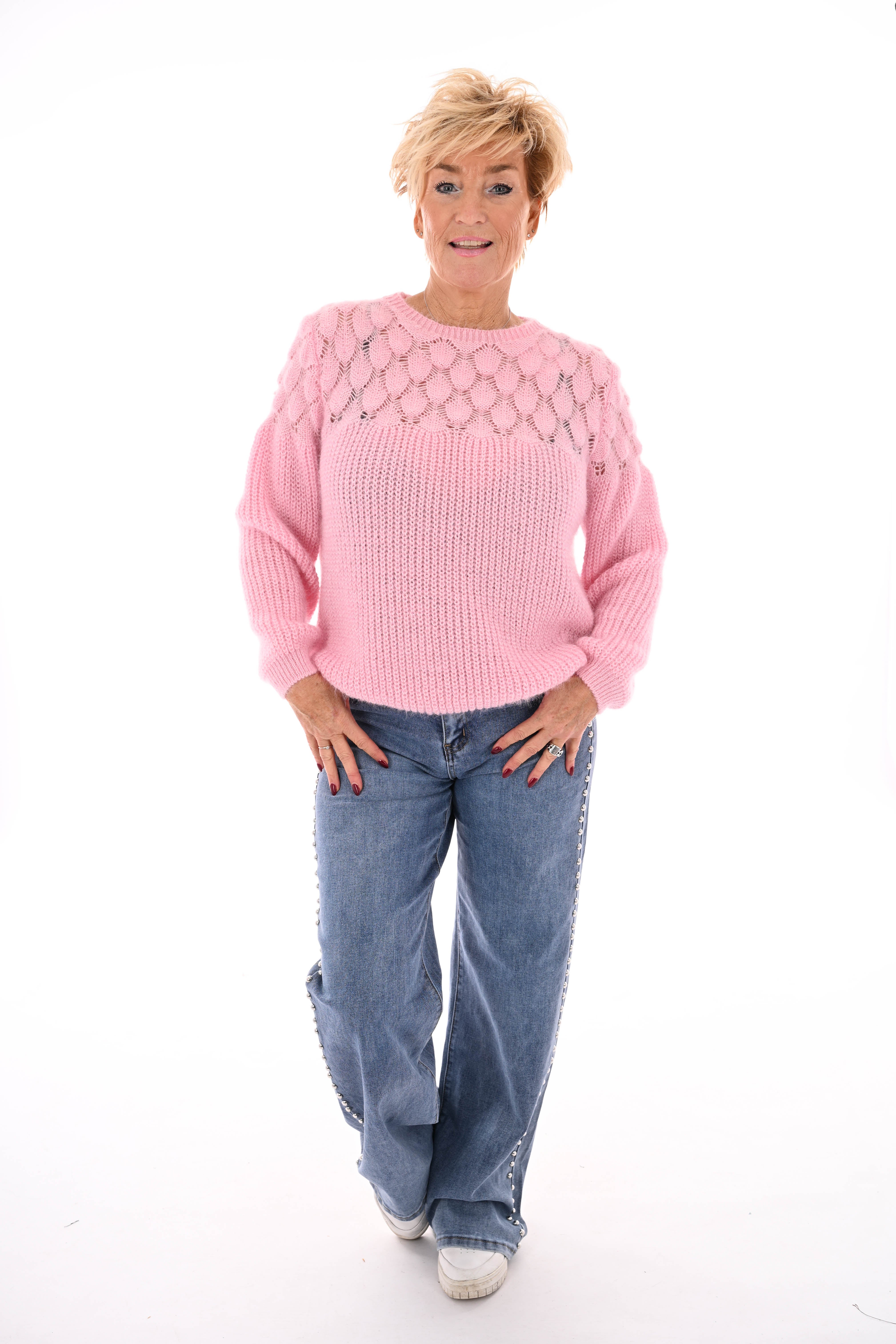 Gehaakte trui hals detail lichtroze