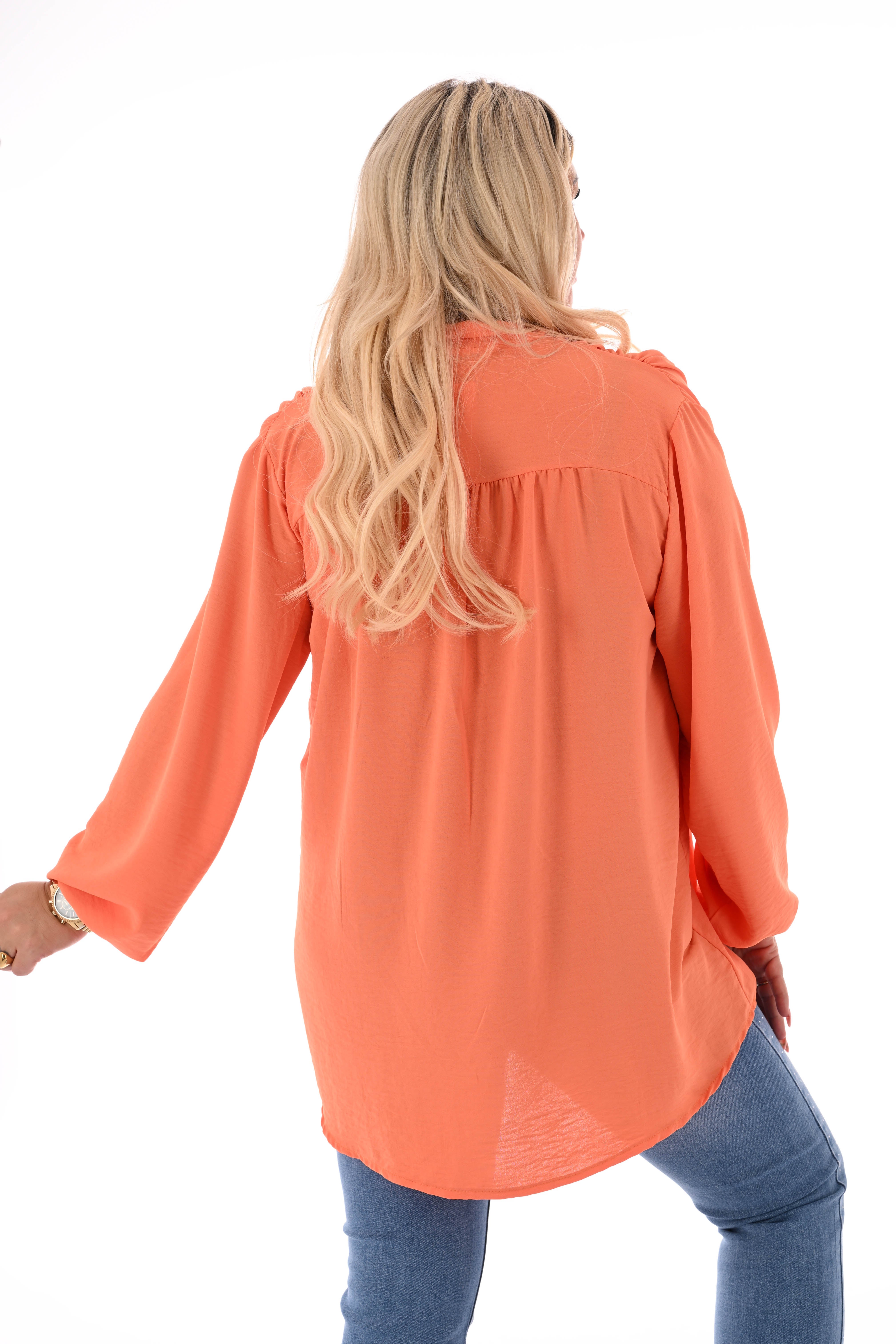 Top lange mouwen met strik oranje