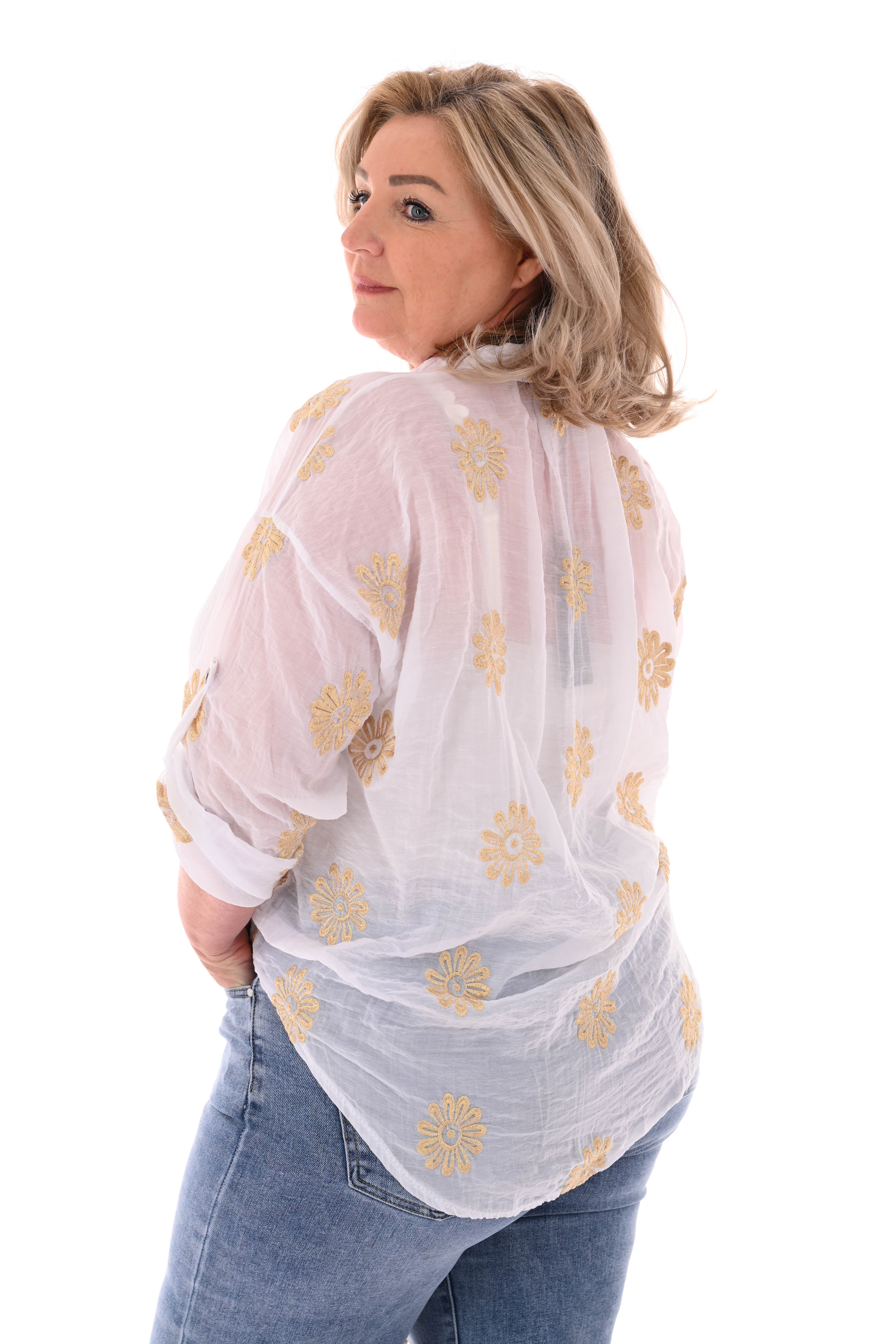 Doorknoop blouse ophaalmouwen borduursels wit