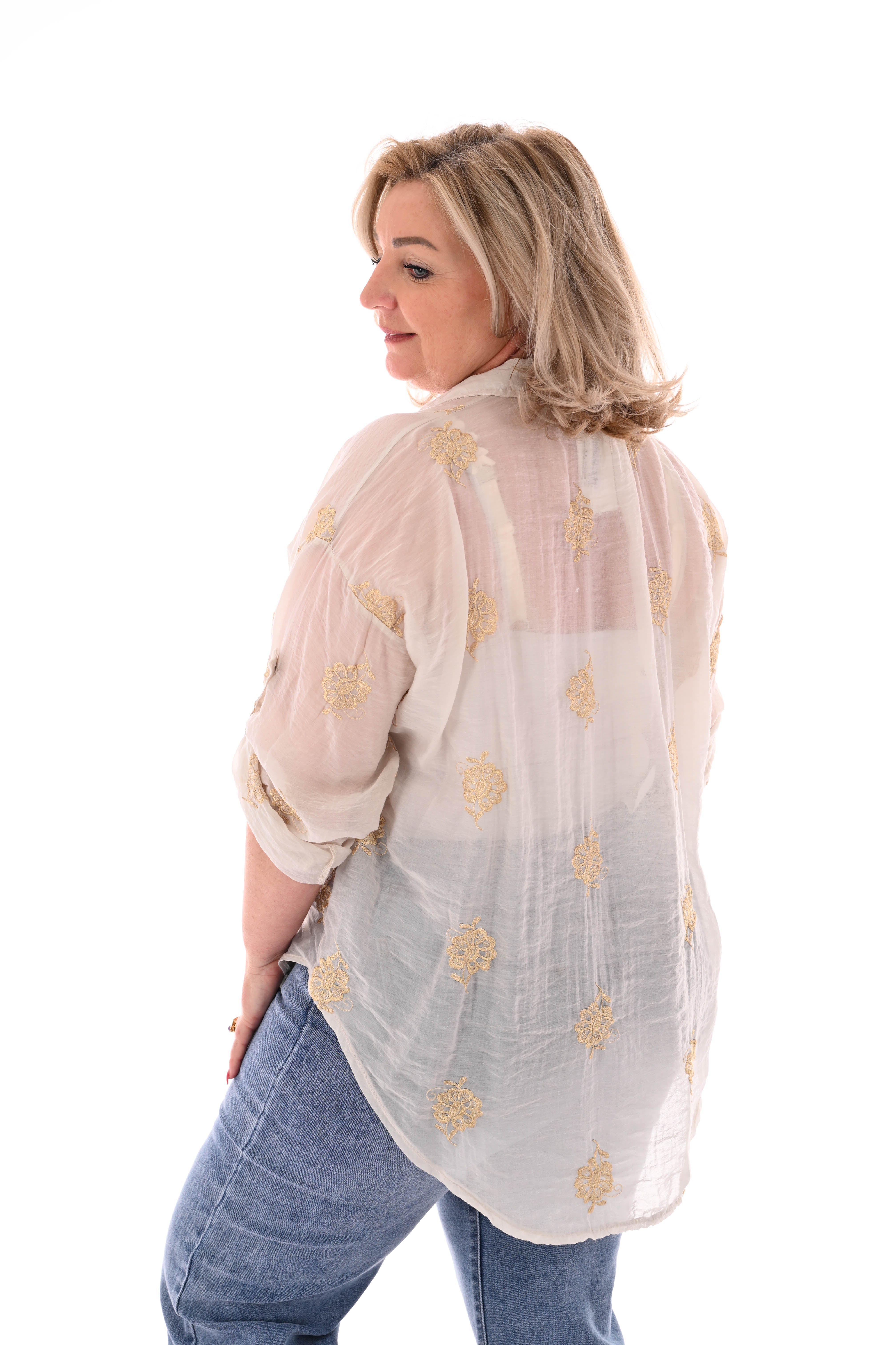 Doorknoop blouse ophaalmouwen borduursels beige