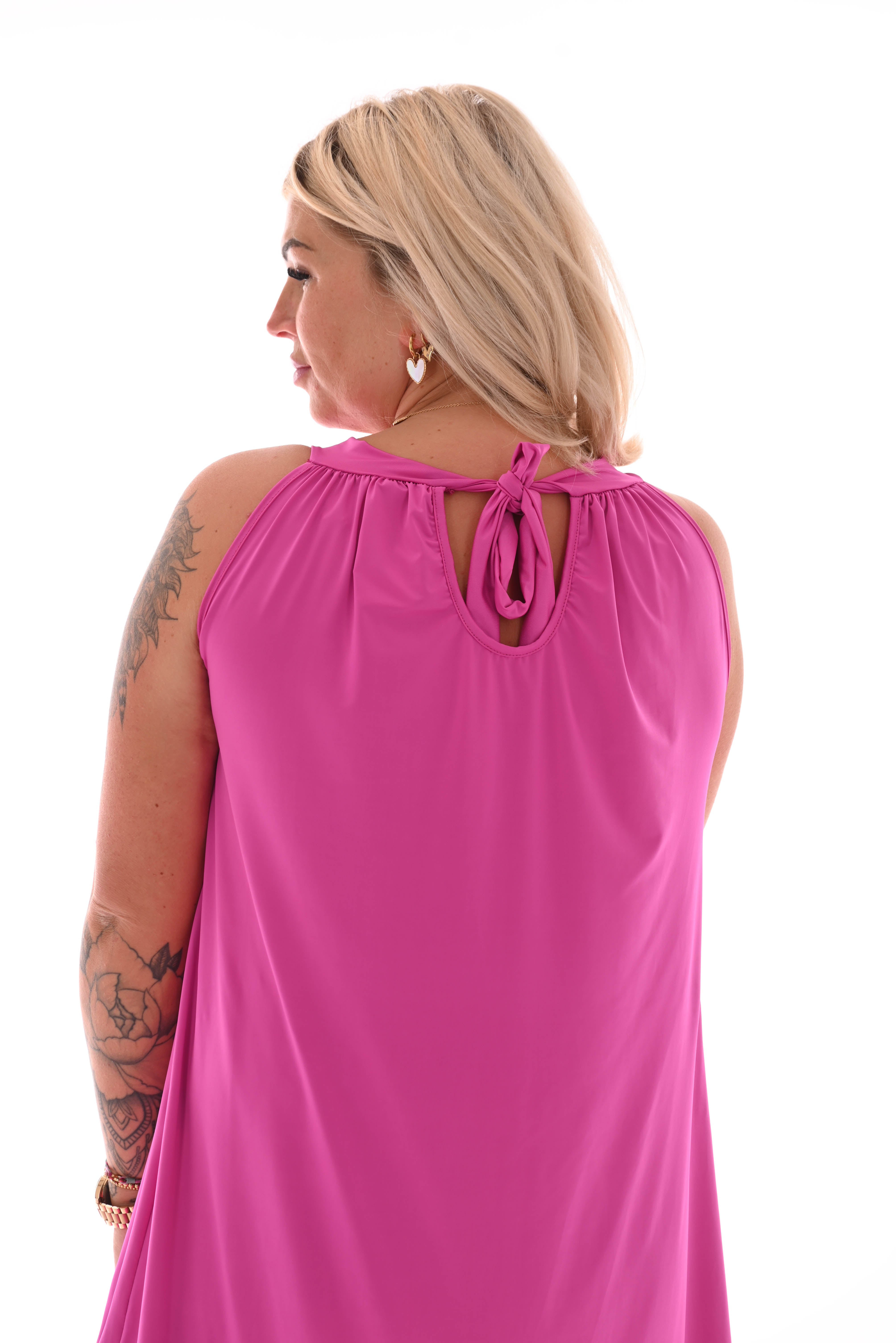 Halterjurk halflang uni magenta