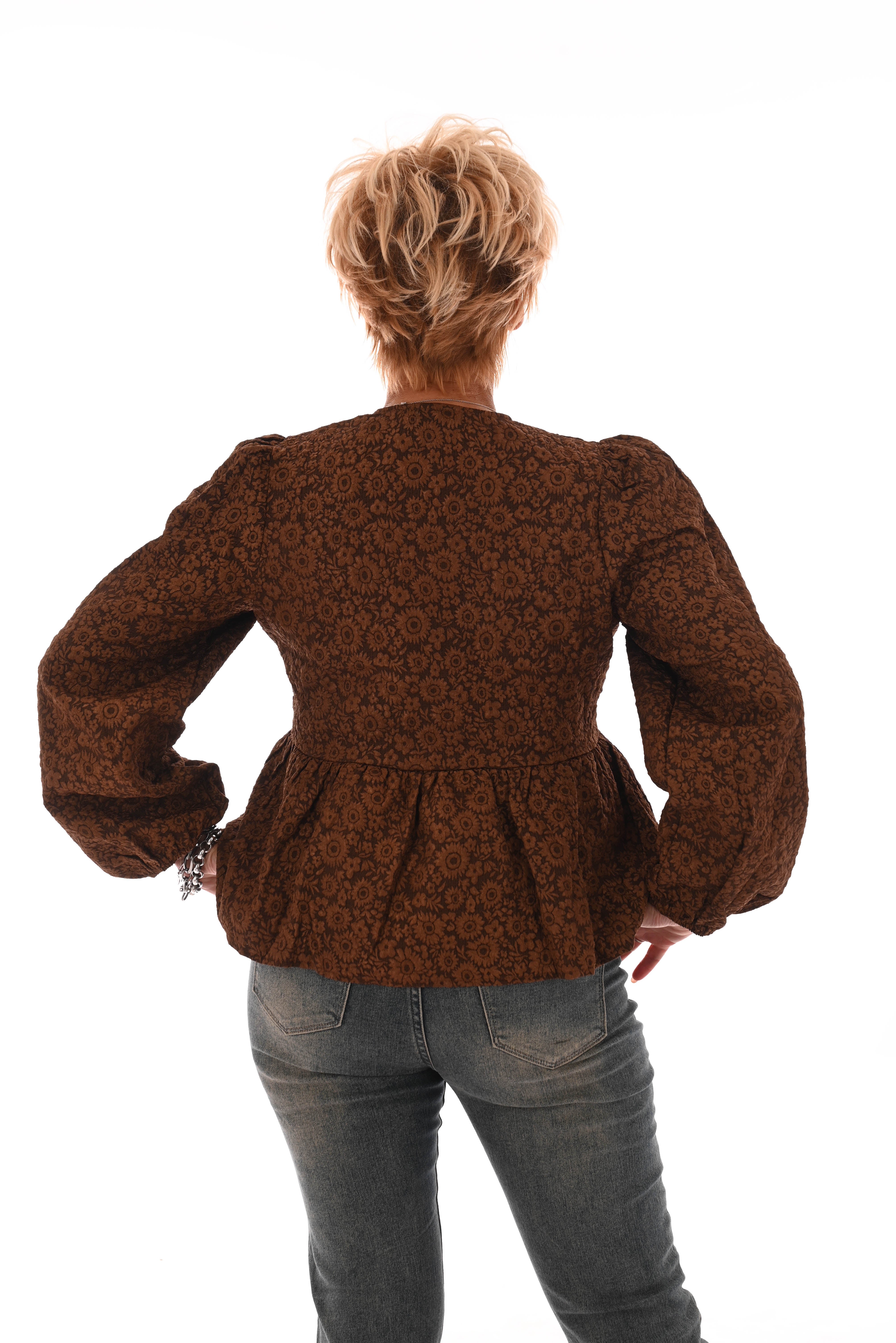 Strik blouse bloemen wijde uitloop bruin