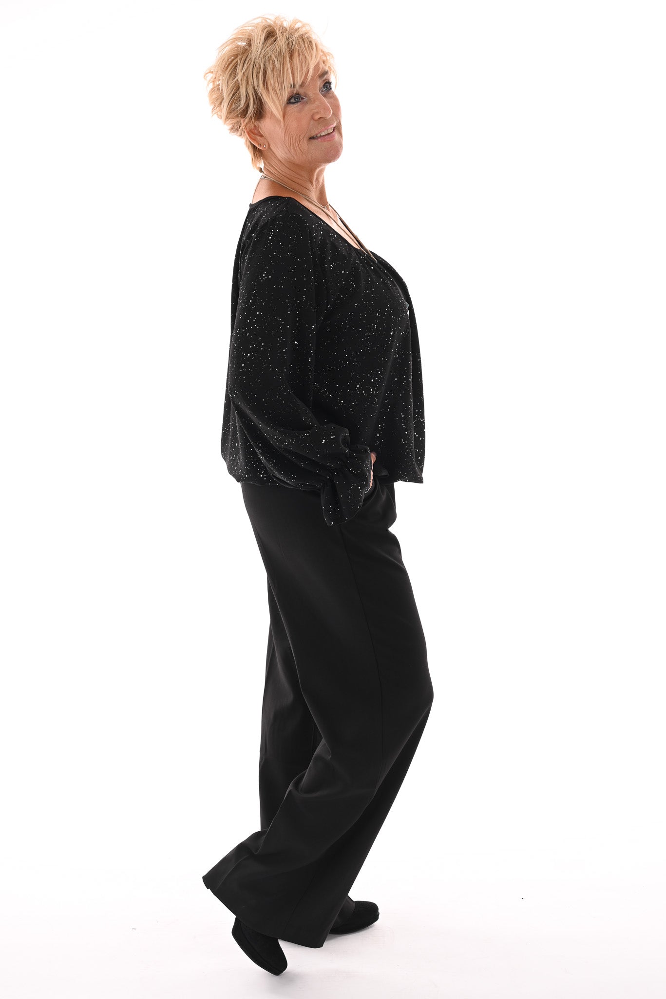 Ballon top glitter trompetmouwen met ketting zwart