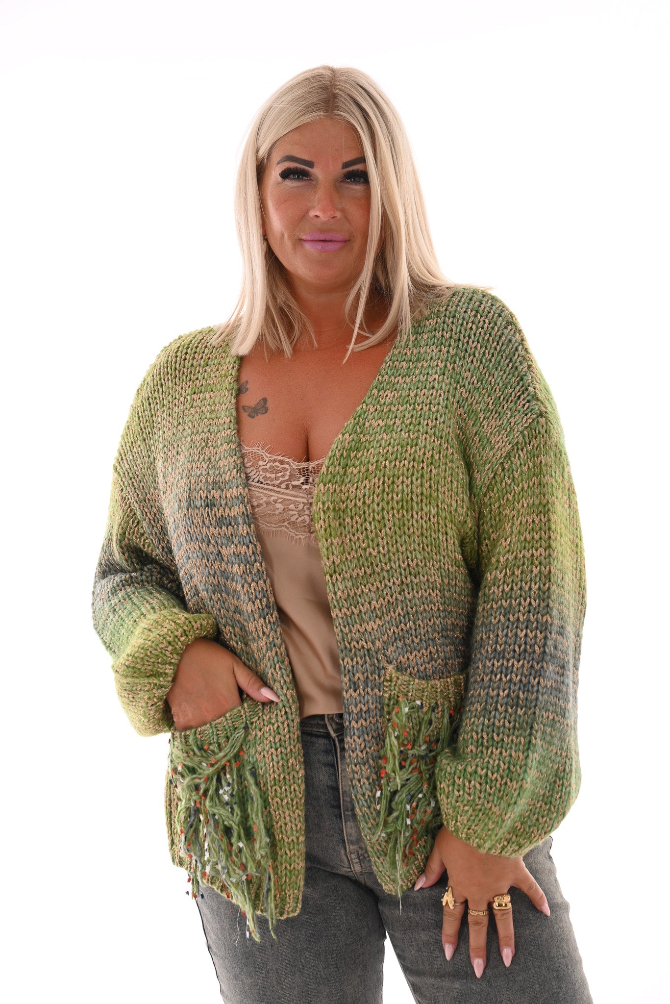 Gebreid vest gekleurd met franjes groen