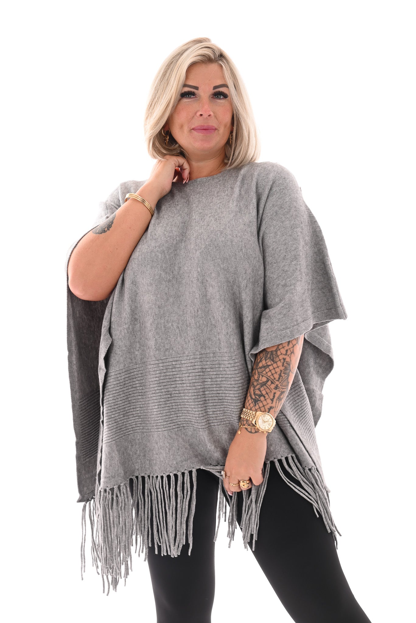 Poncho met franjes grijs