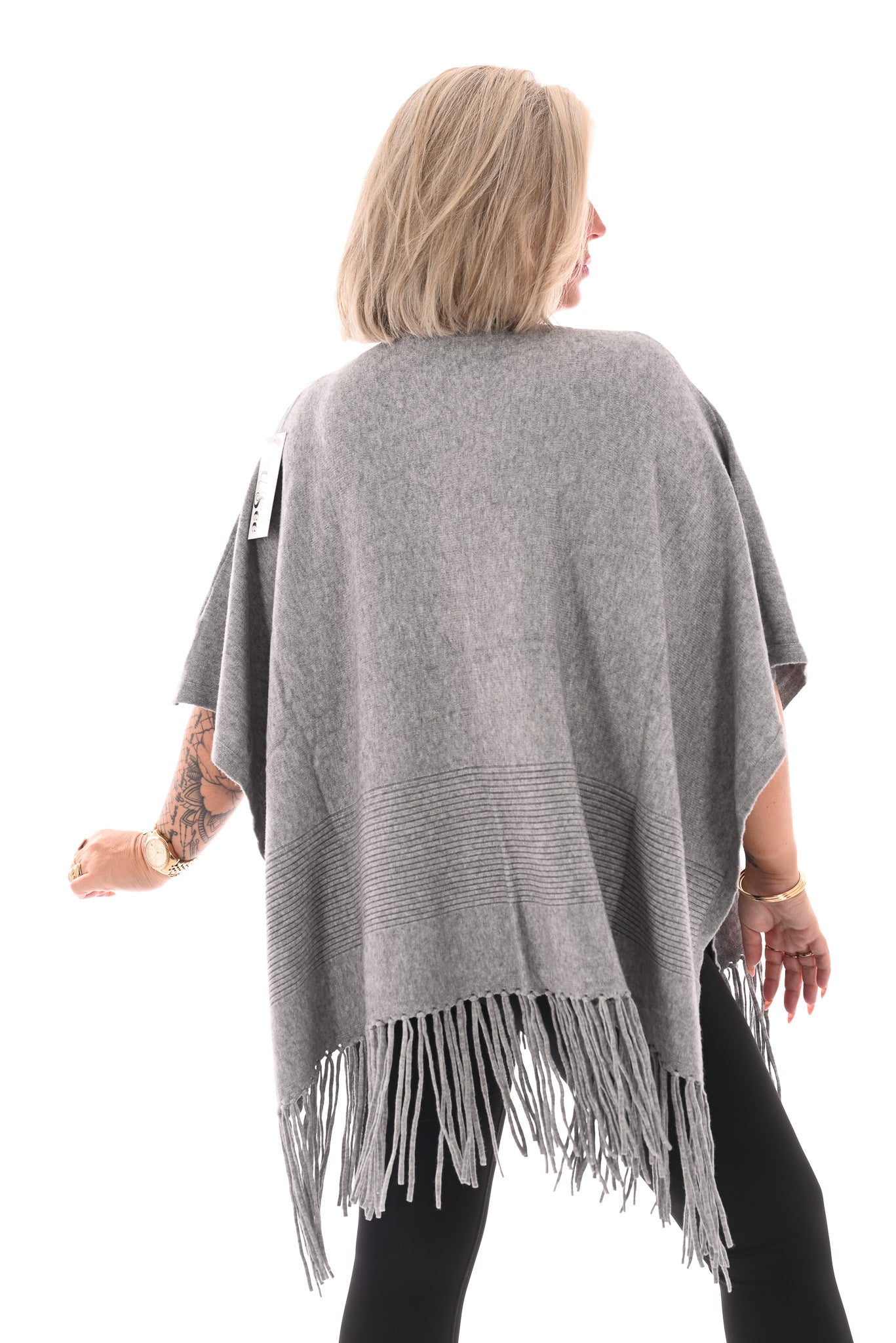 Poncho met franjes grijs