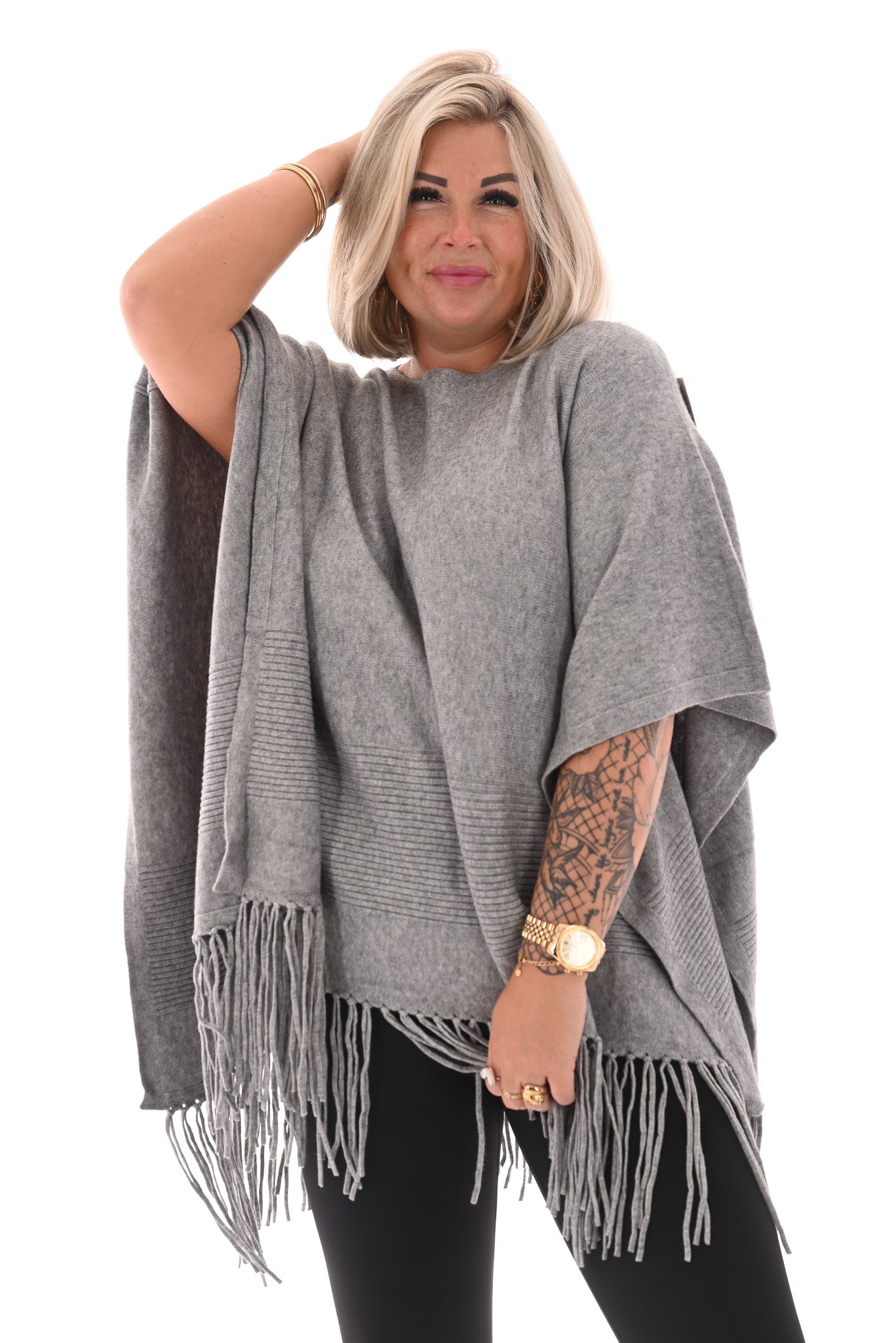 Poncho met franjes grijs