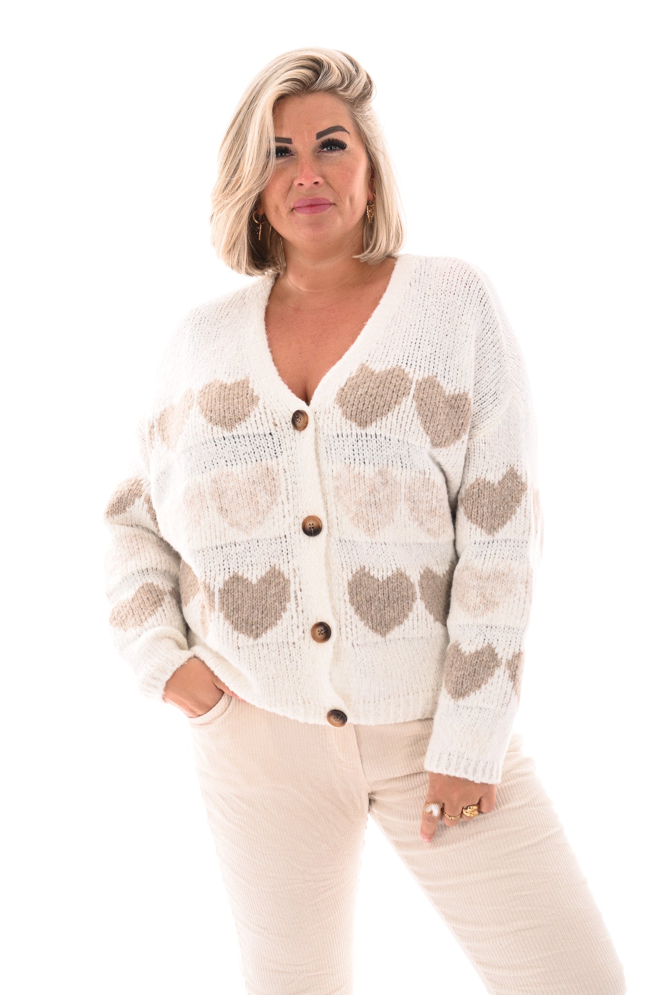 Fijn gebreid vest hartjes roomwit