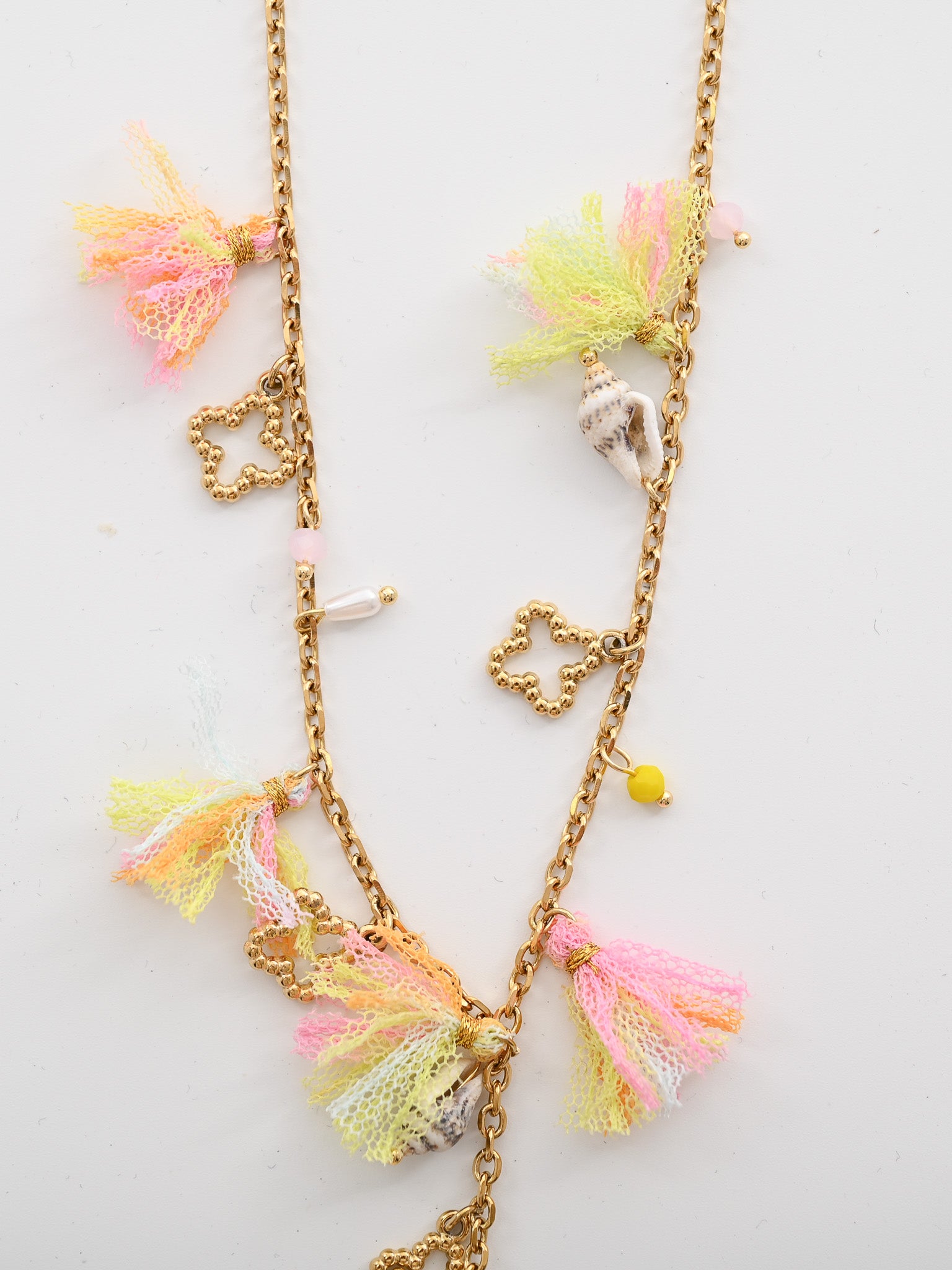 Ketting schelpjes en kwastjes