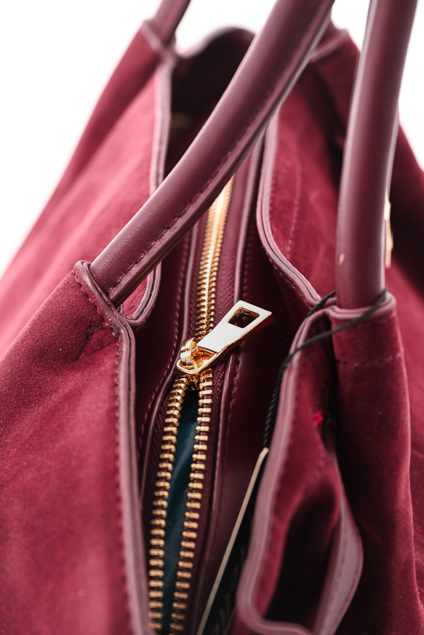 Suedinelook schoudertas met gesp bordeaux