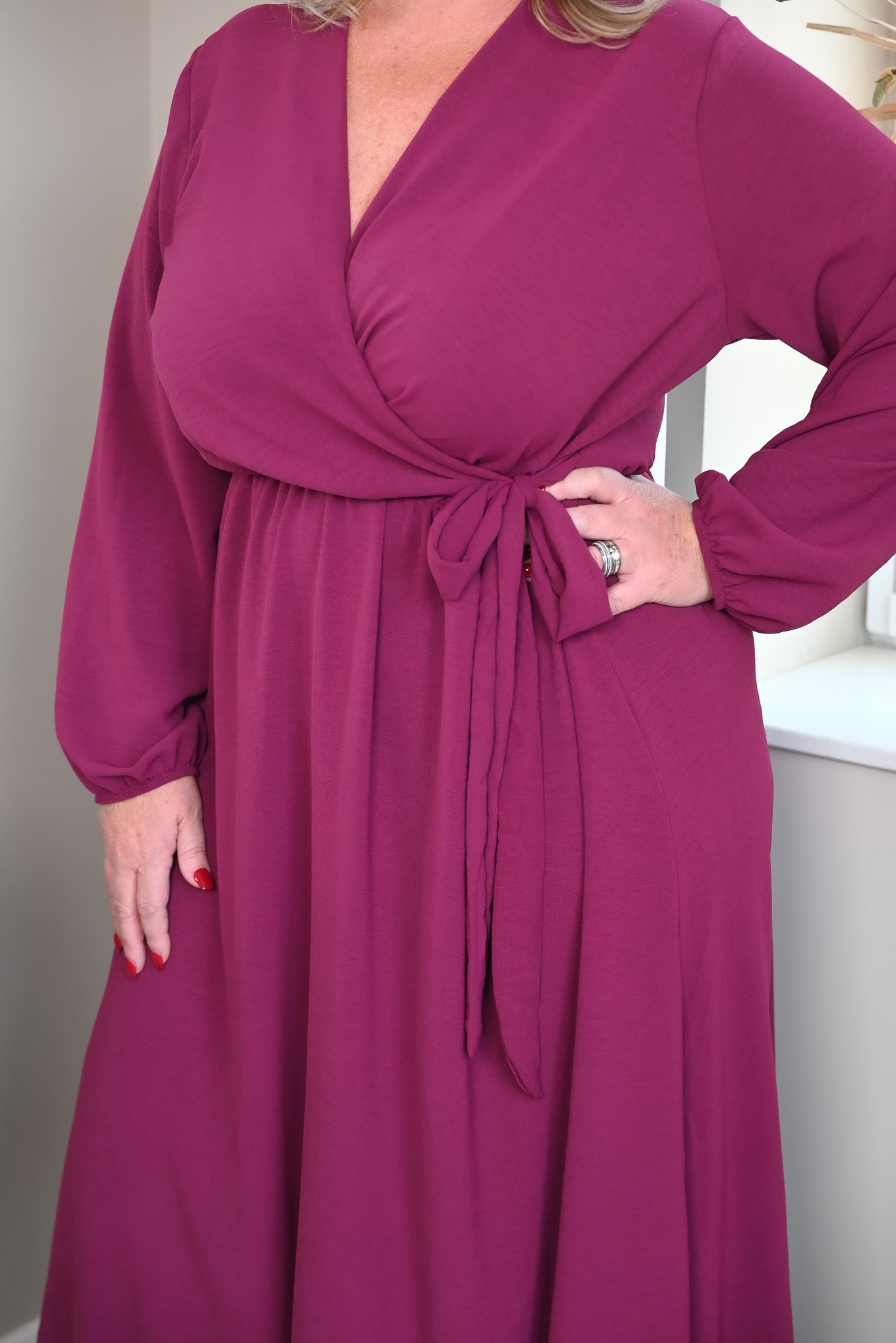 Maxi jurk lange mouwen met strik uni magenta