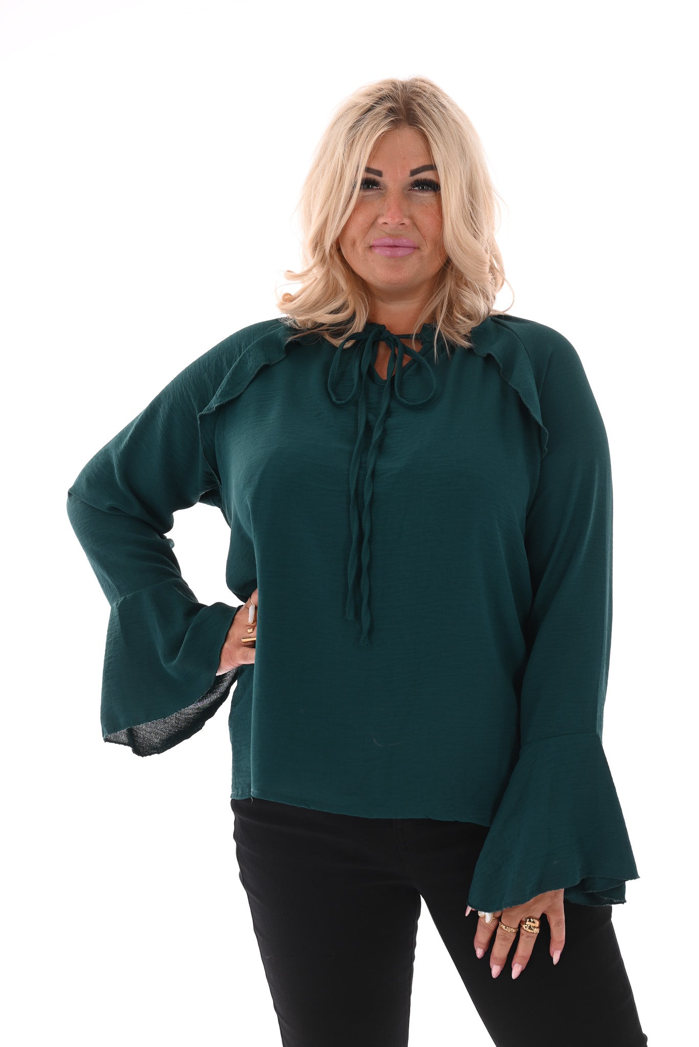 Blouse met roezels en trompetmouwen flessengroen