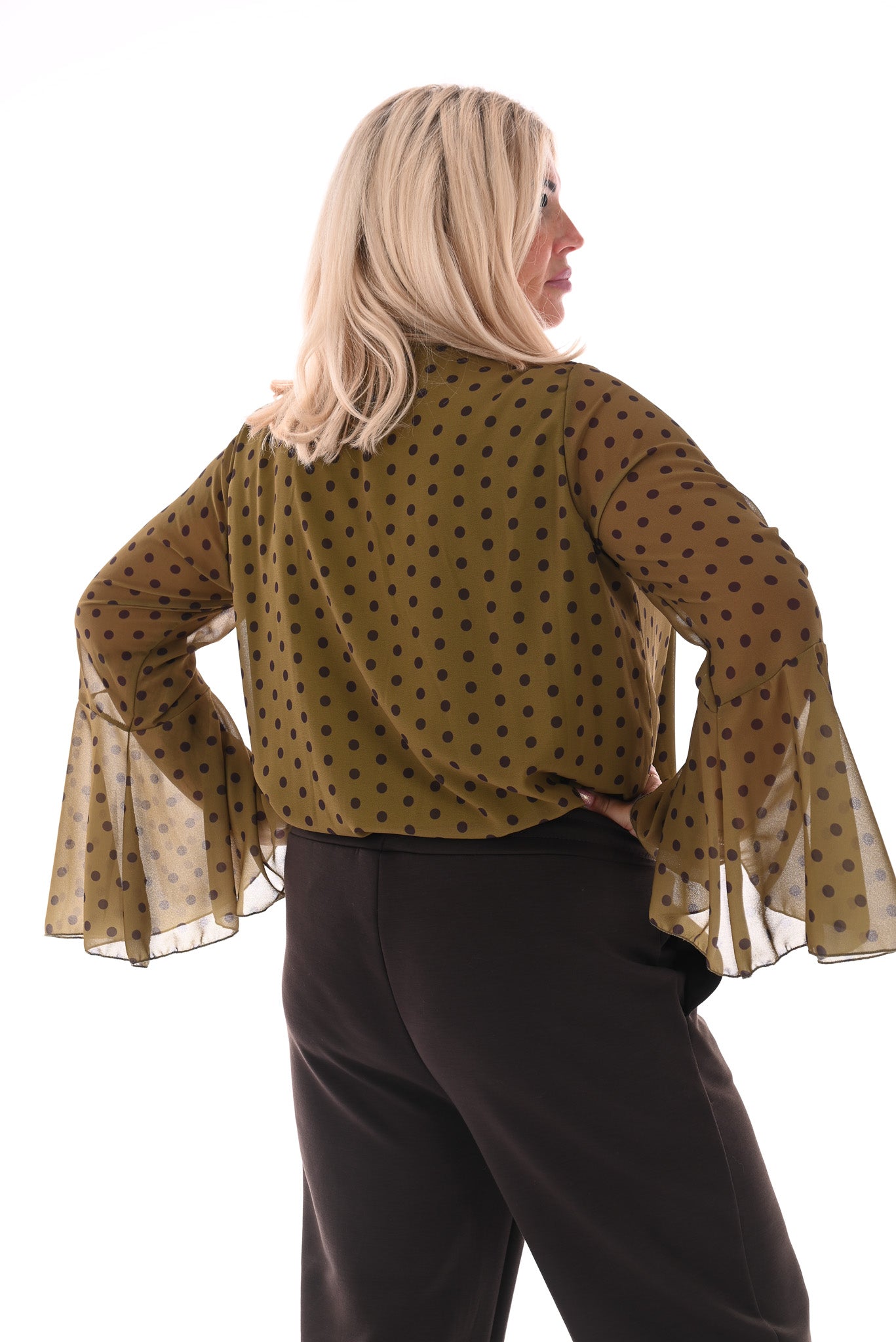 Top dots met strik en trompetmouwen groen