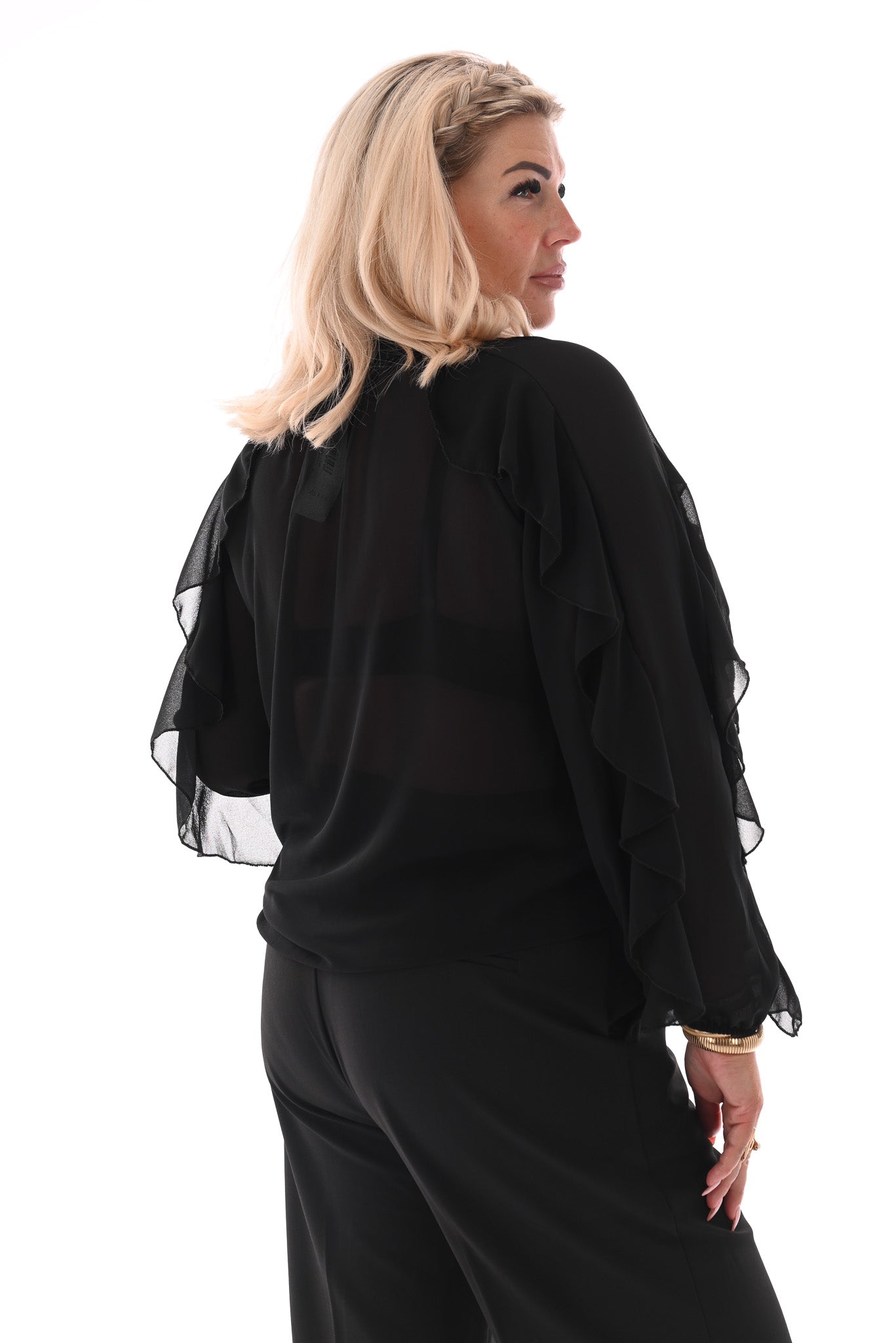Doorknoop blouse ruffels uni zwart