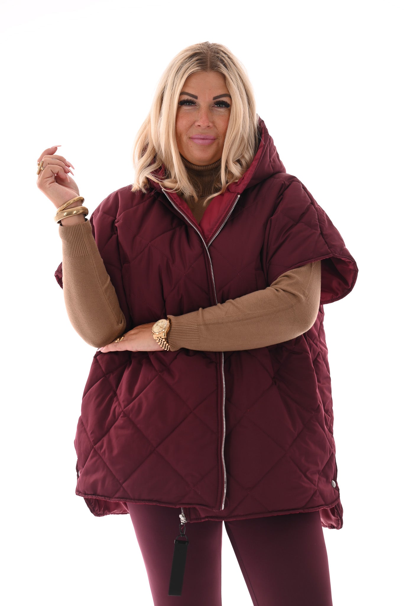 Gewatteerde ponchojas met capuchon bordeaux