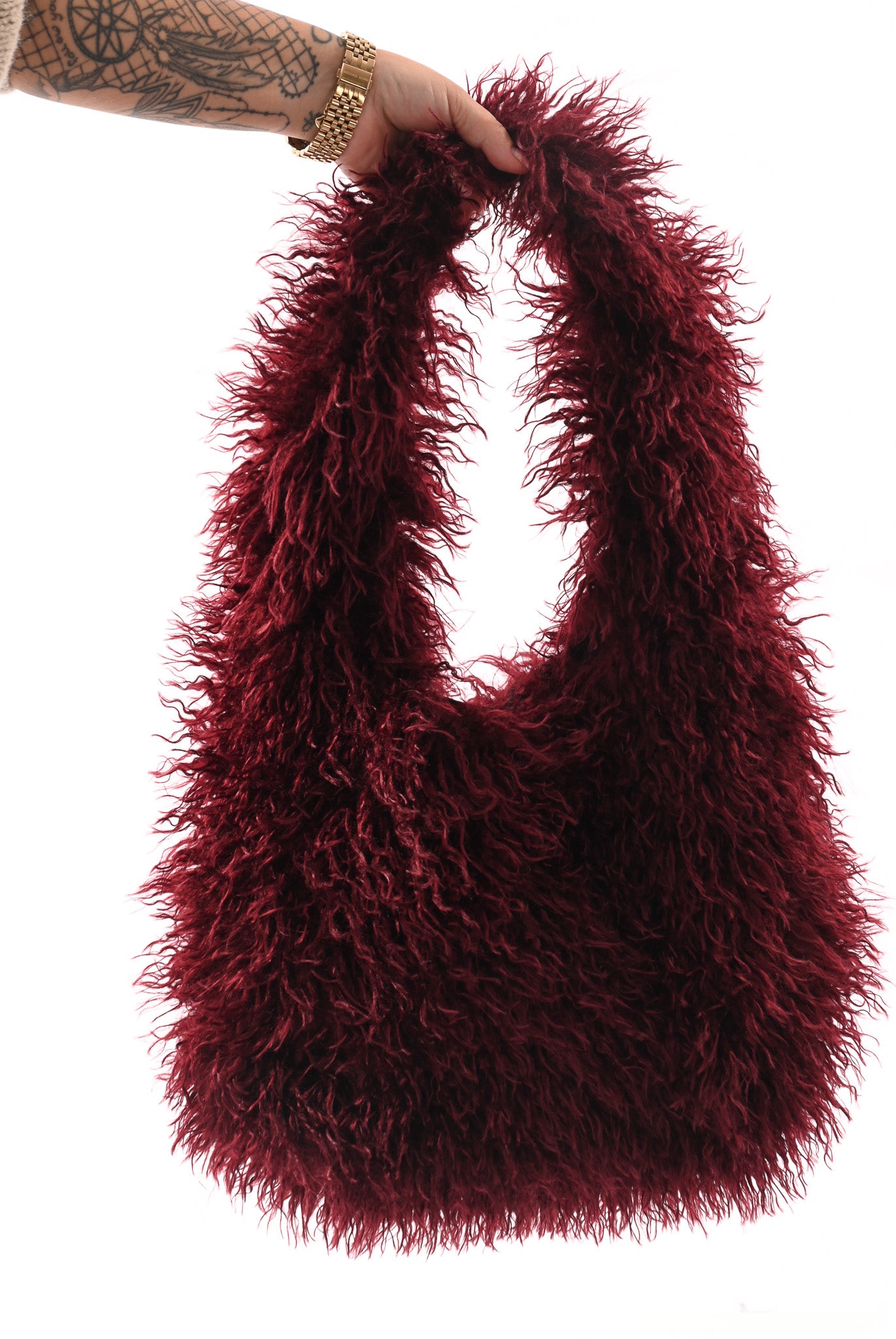 Wavy faux fur schoudertas bordeaux
