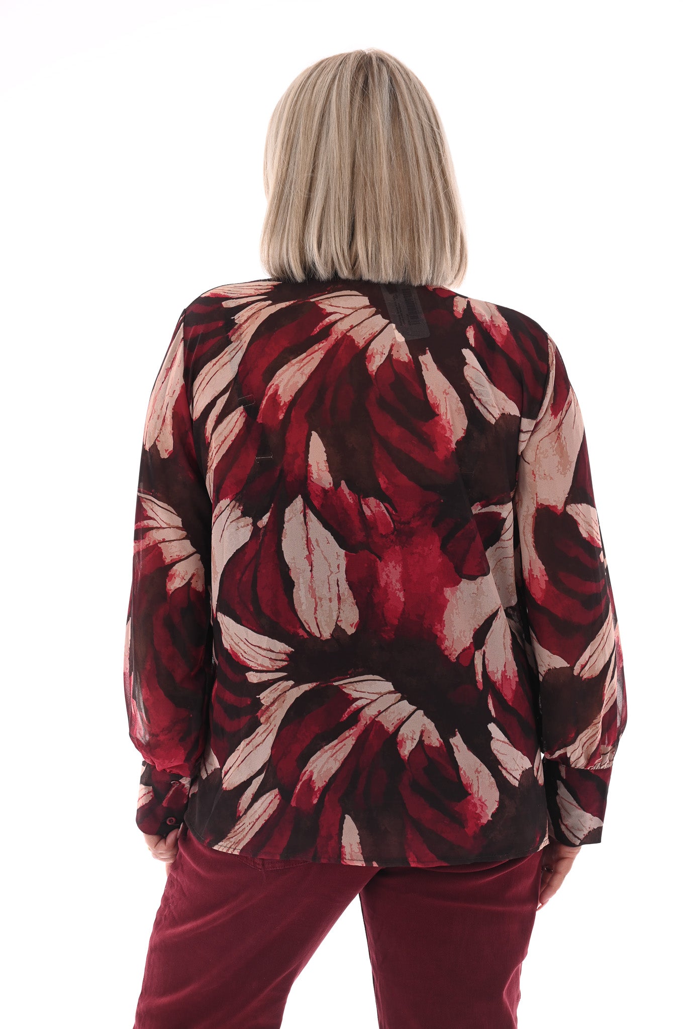 Doorknoop blouse strik roezels abstracte print bordeaux