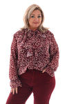 Doorknoop blouse roezels met trompetmouwen bordeaux