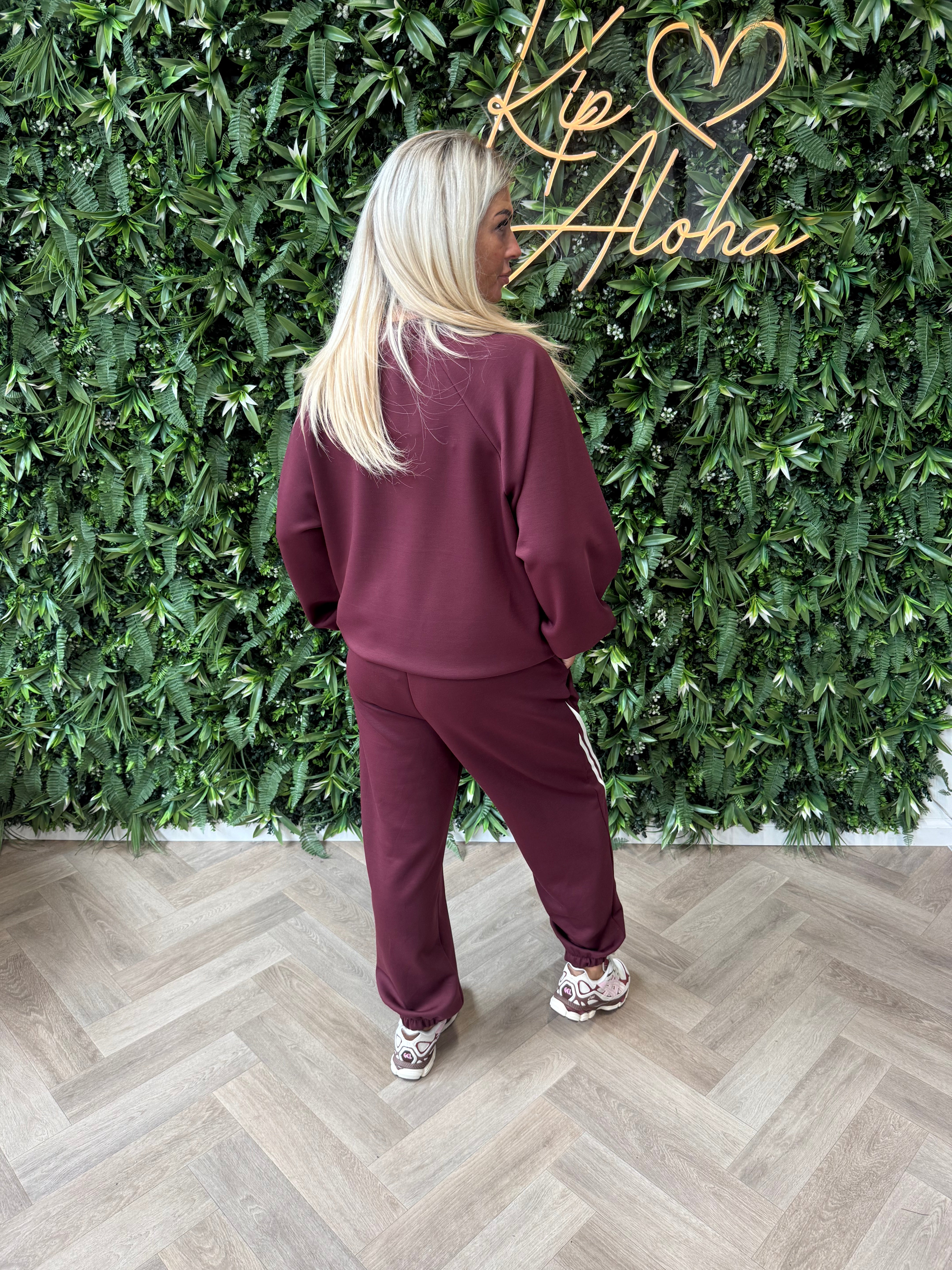 Joggingspak elastieken onderkant met bies bordeaux