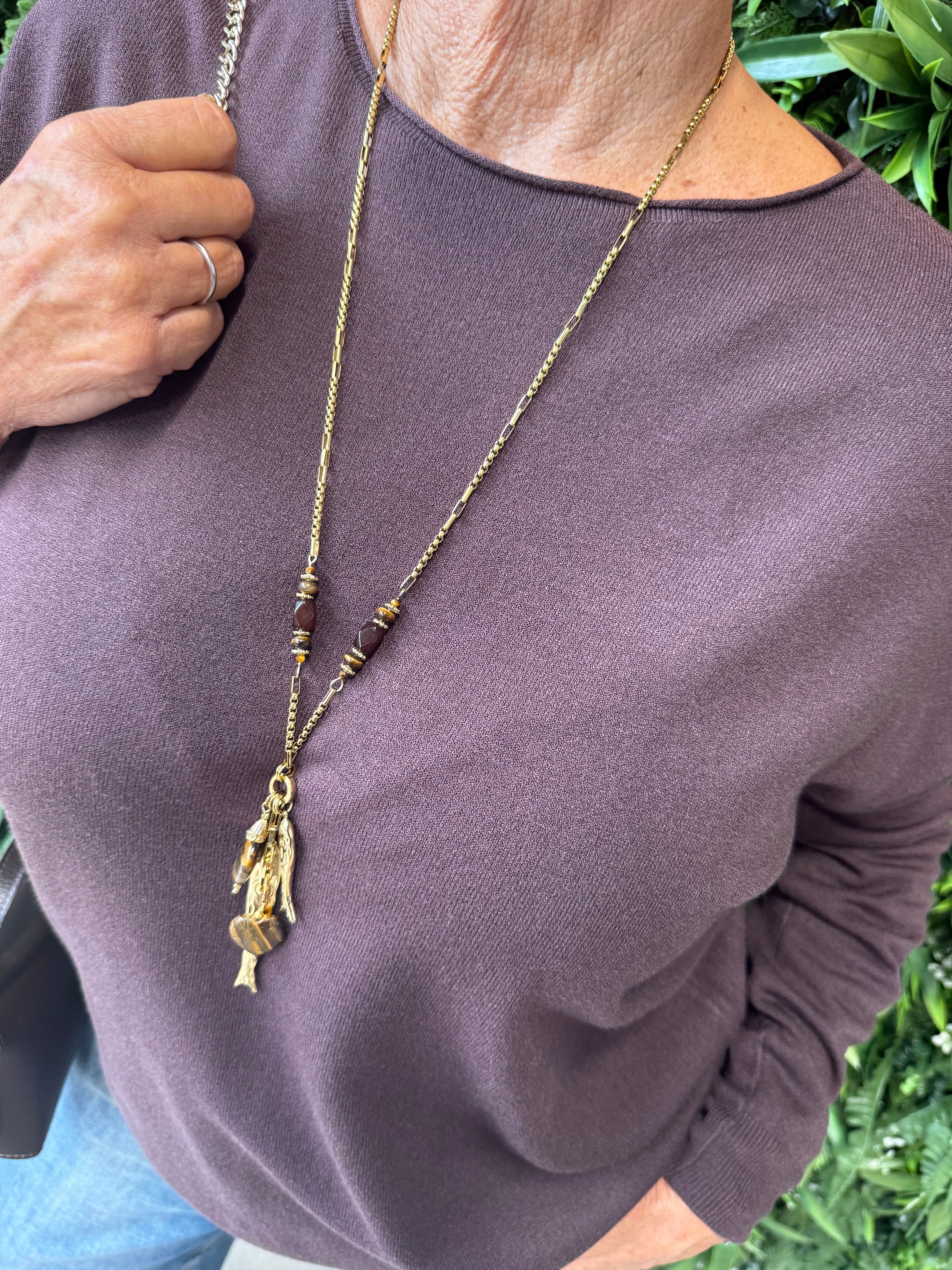 Lange stainless steel ketting met visjes goud