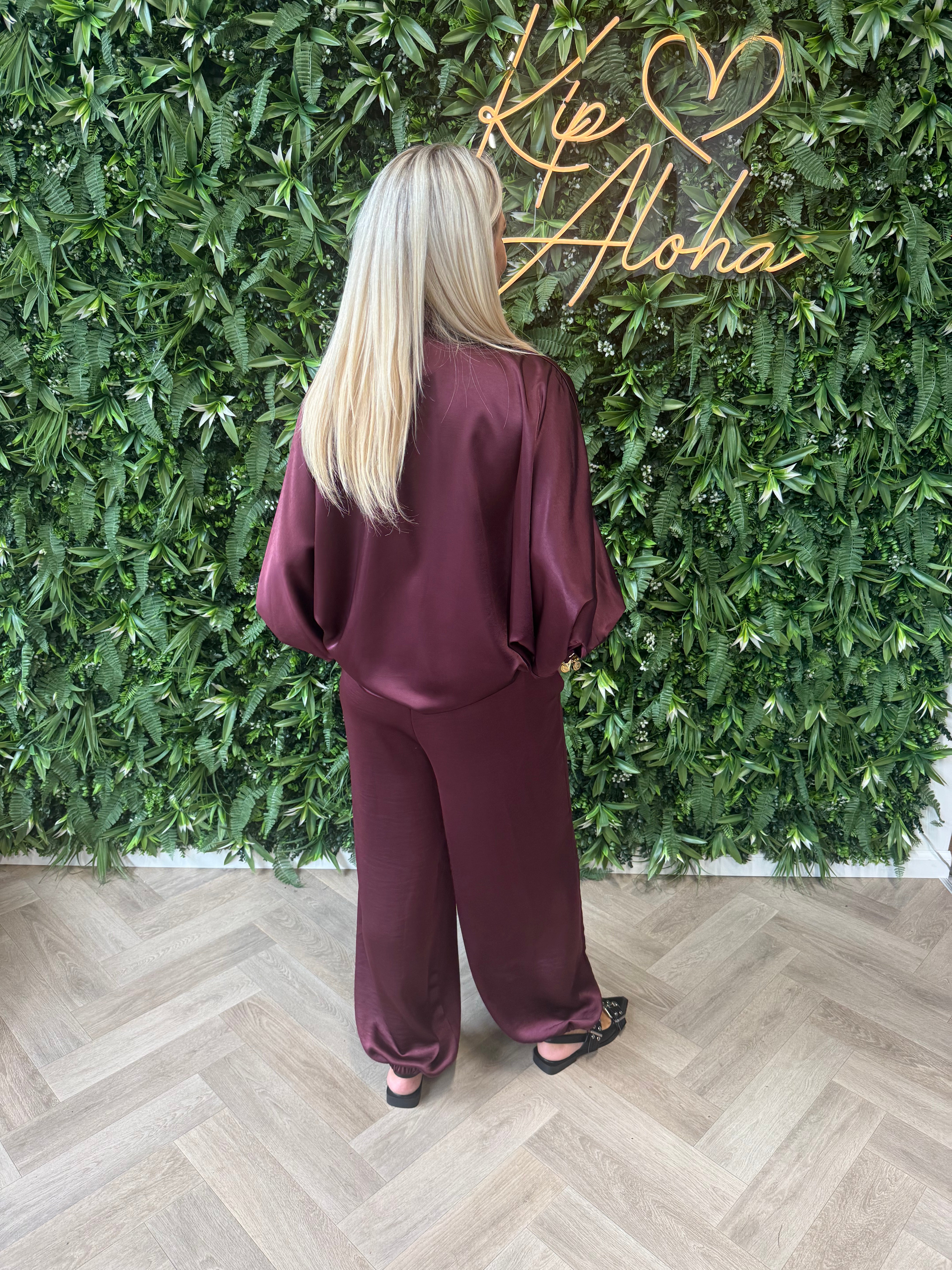 Tweedelig pak ballon broek met strik blouse aubergine