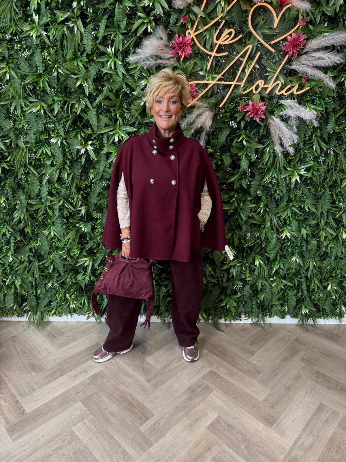 Poncho jasje met knopen bordeaux