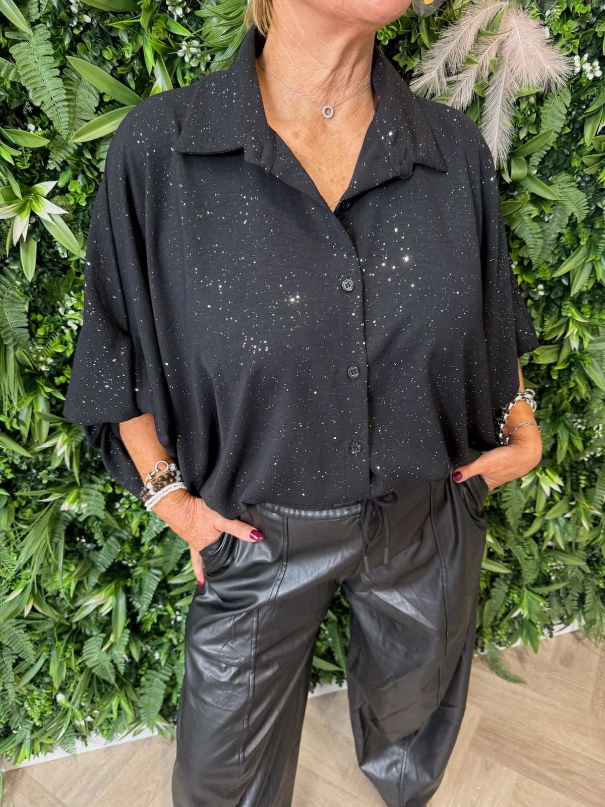 Blouse glitter flakes pofmouwen zwart