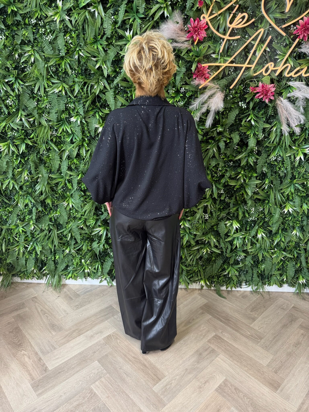 Blouse glitter flakes pofmouwen zwart