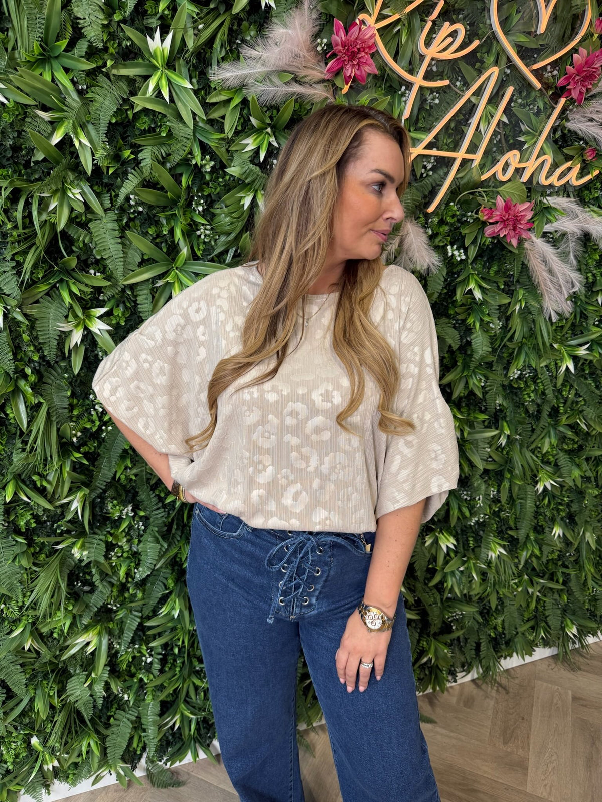 Top structuur pofmouwen beige