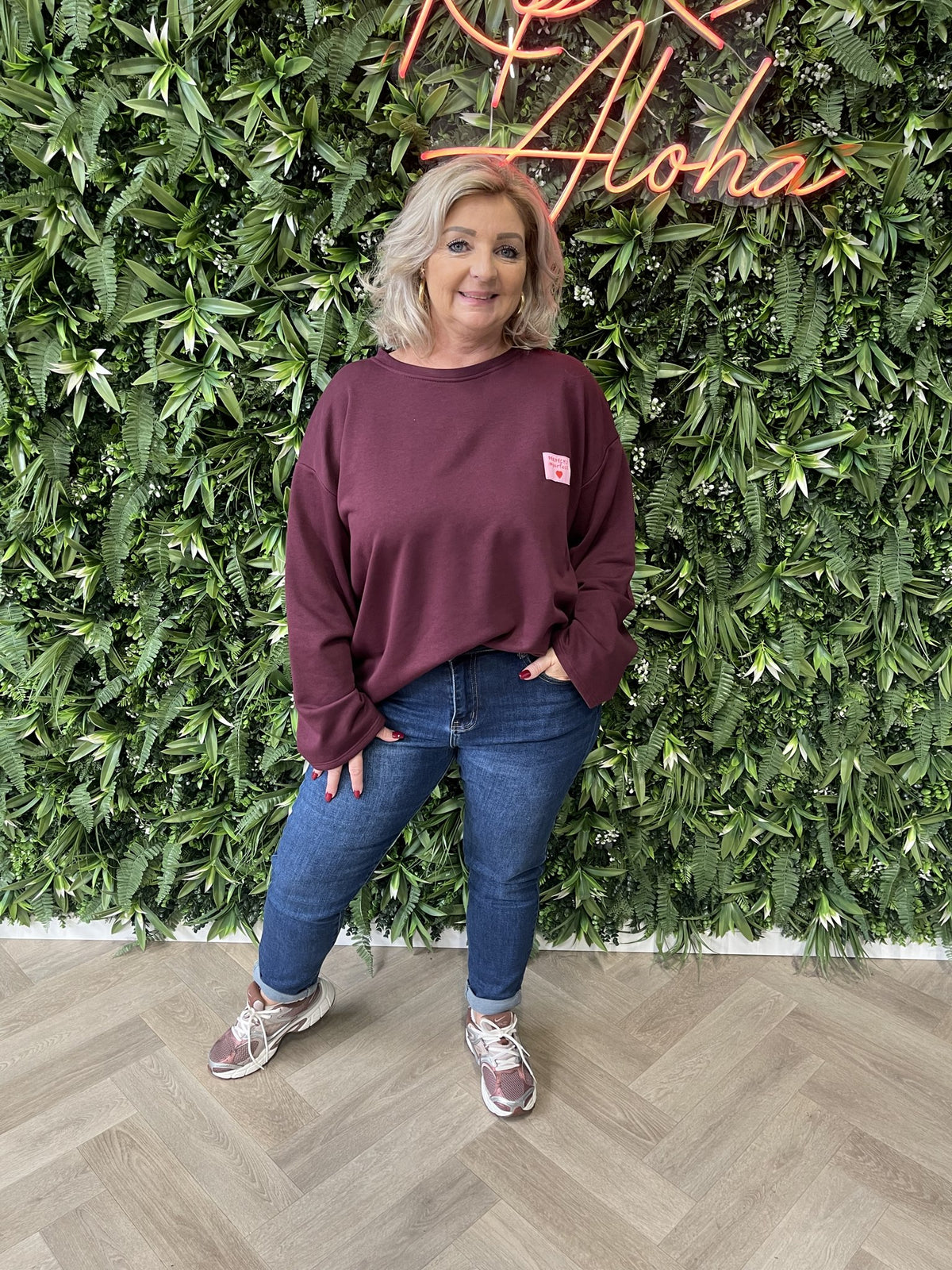 Sweater wijde mouwen applicatie uni aubergine