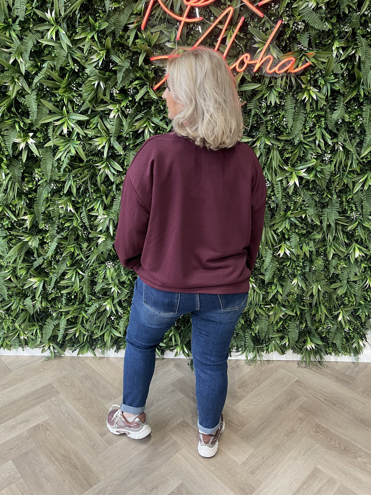 Sweater wijde mouwen applicatie uni aubergine