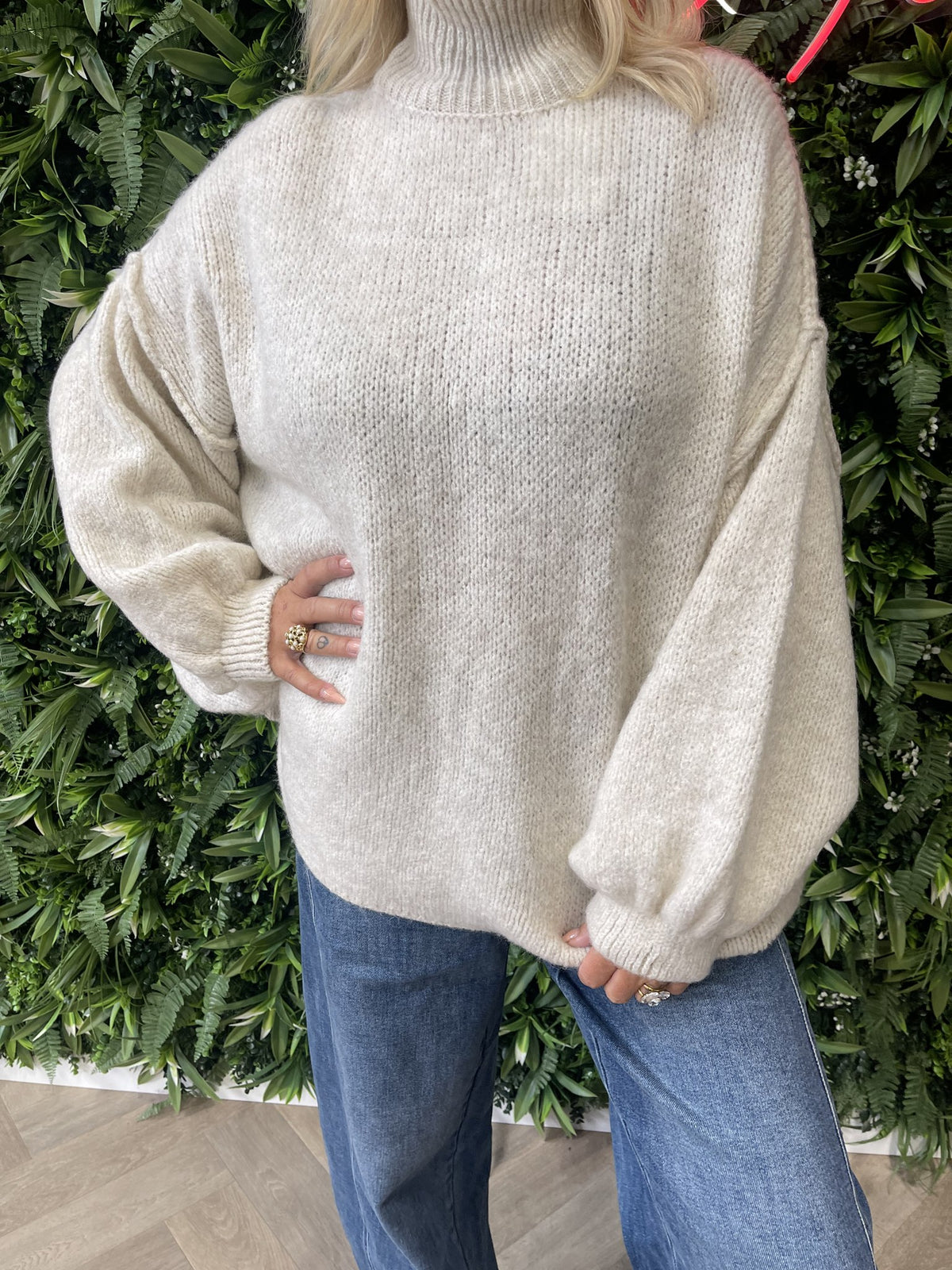 Gebreide trui turtle neck pofmouwen creme