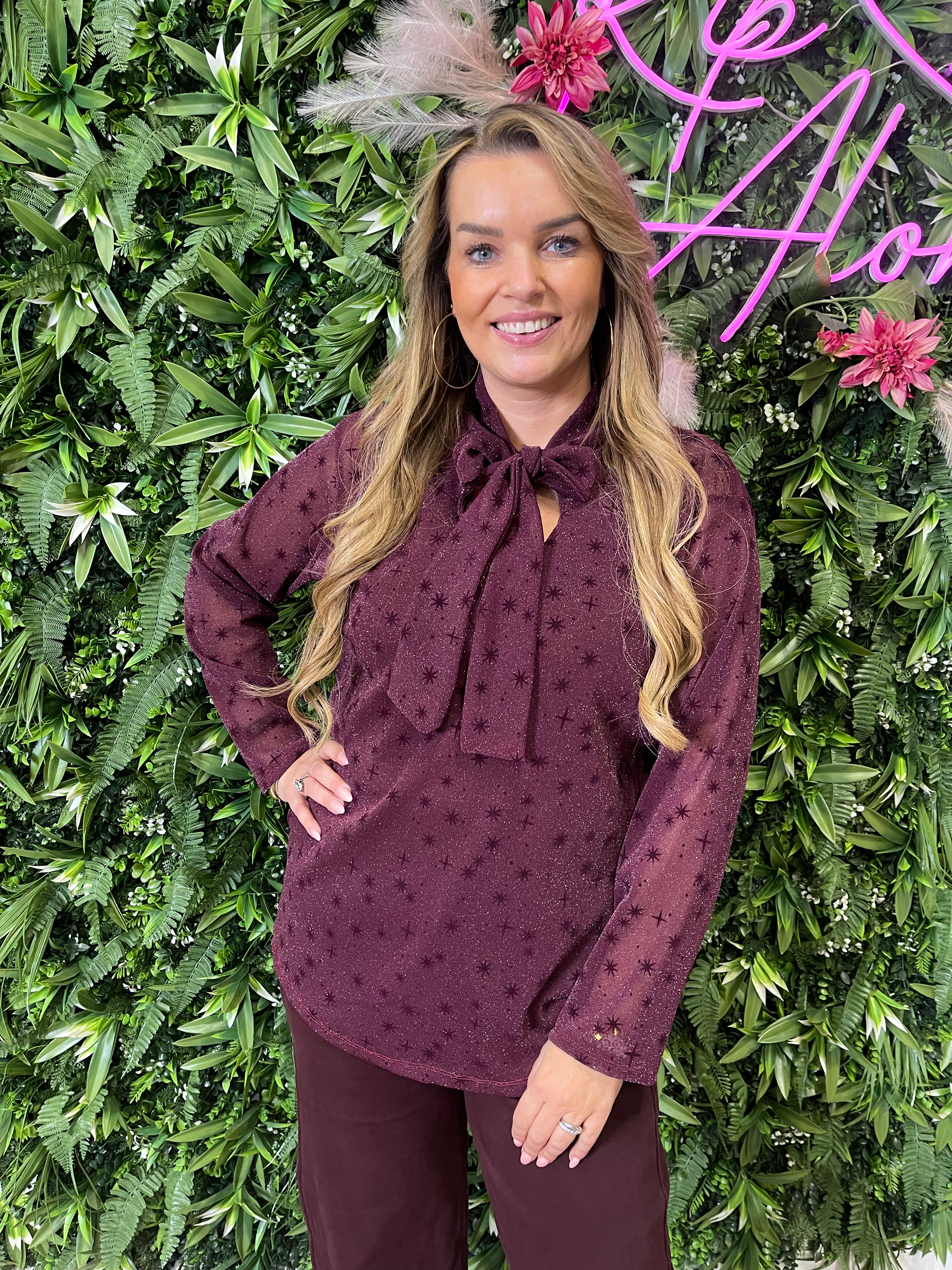 Top lurex met strik aubergine