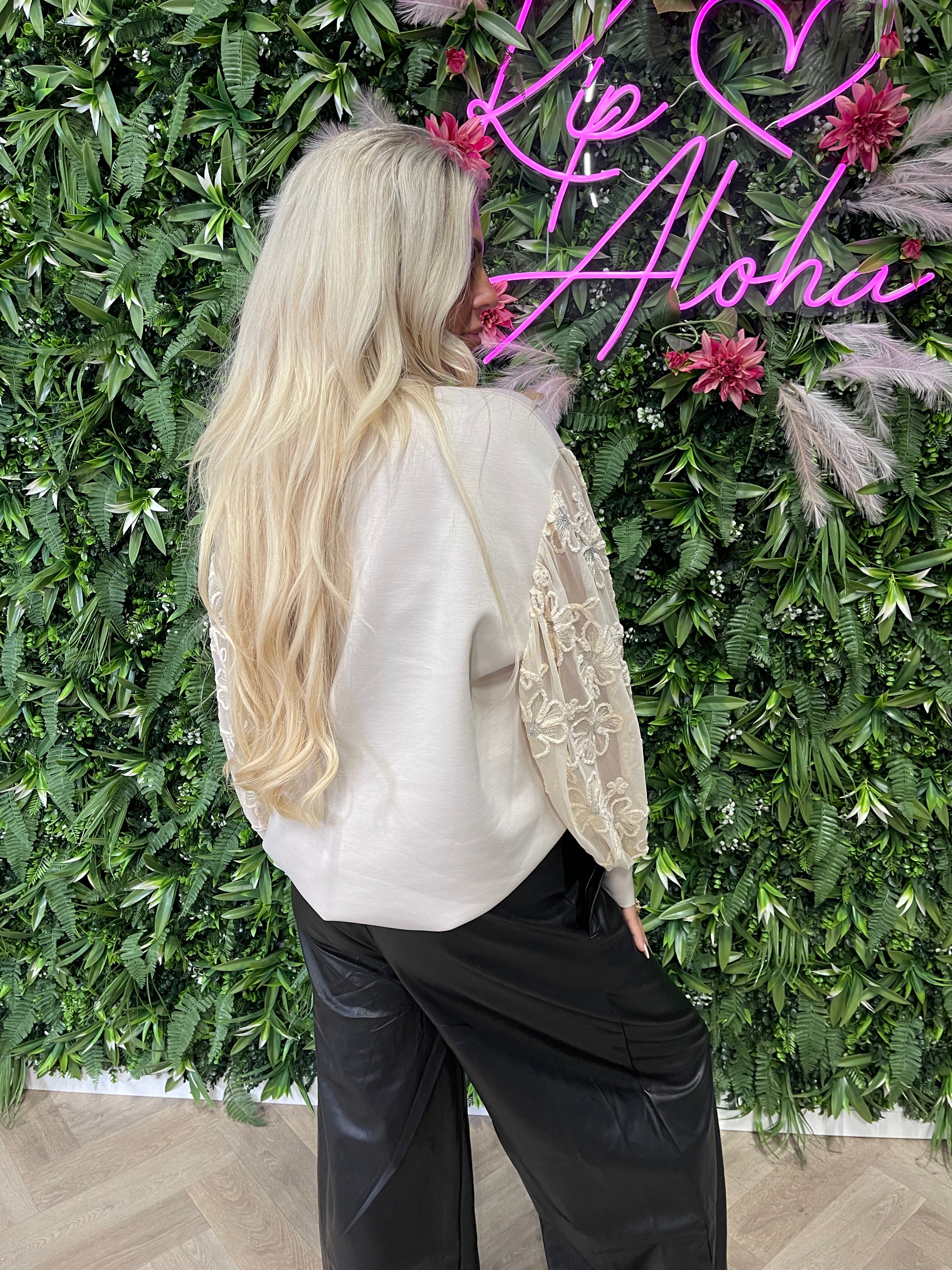 Sweater bloemmotief mouwen beige