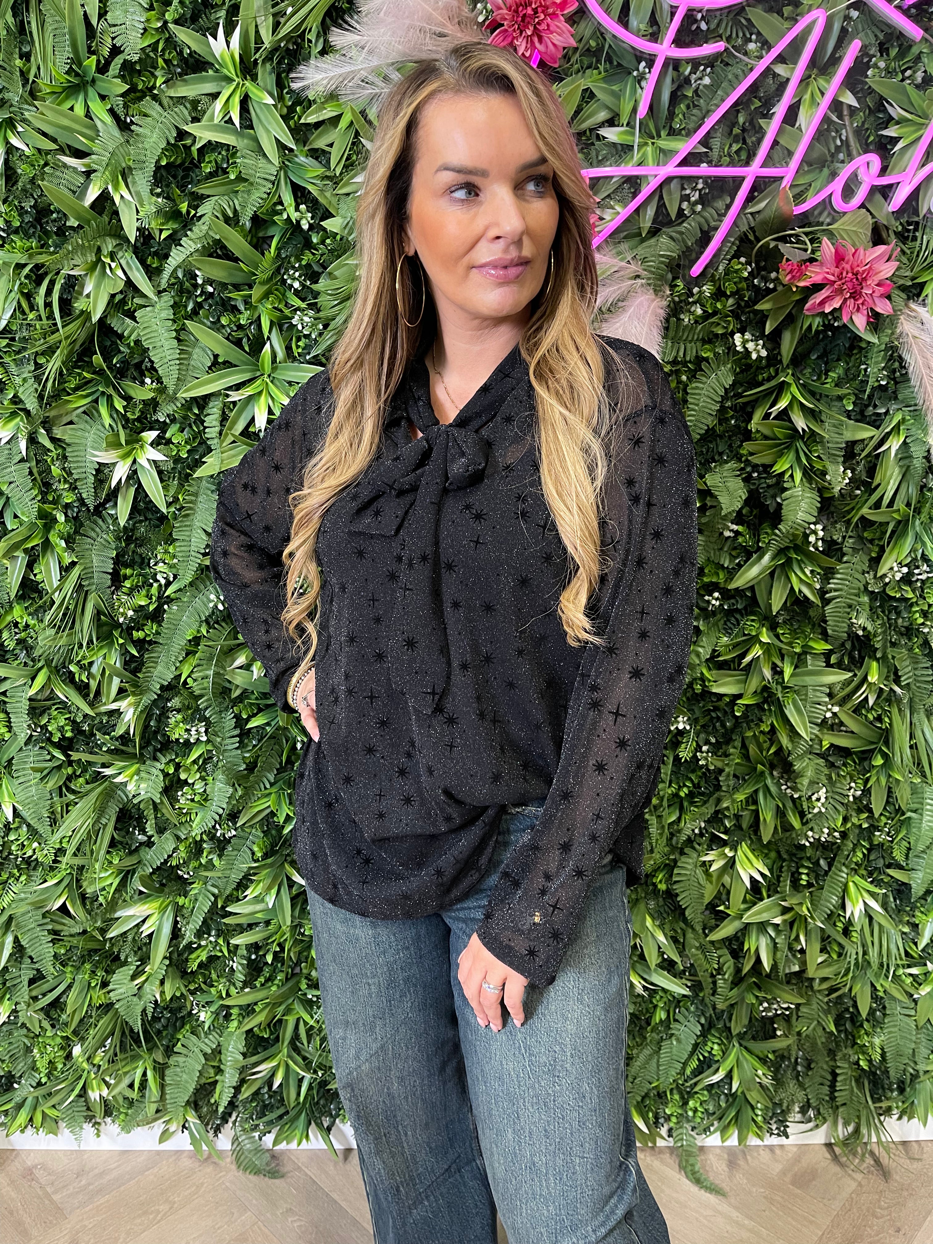 Top lurex met strik zwart