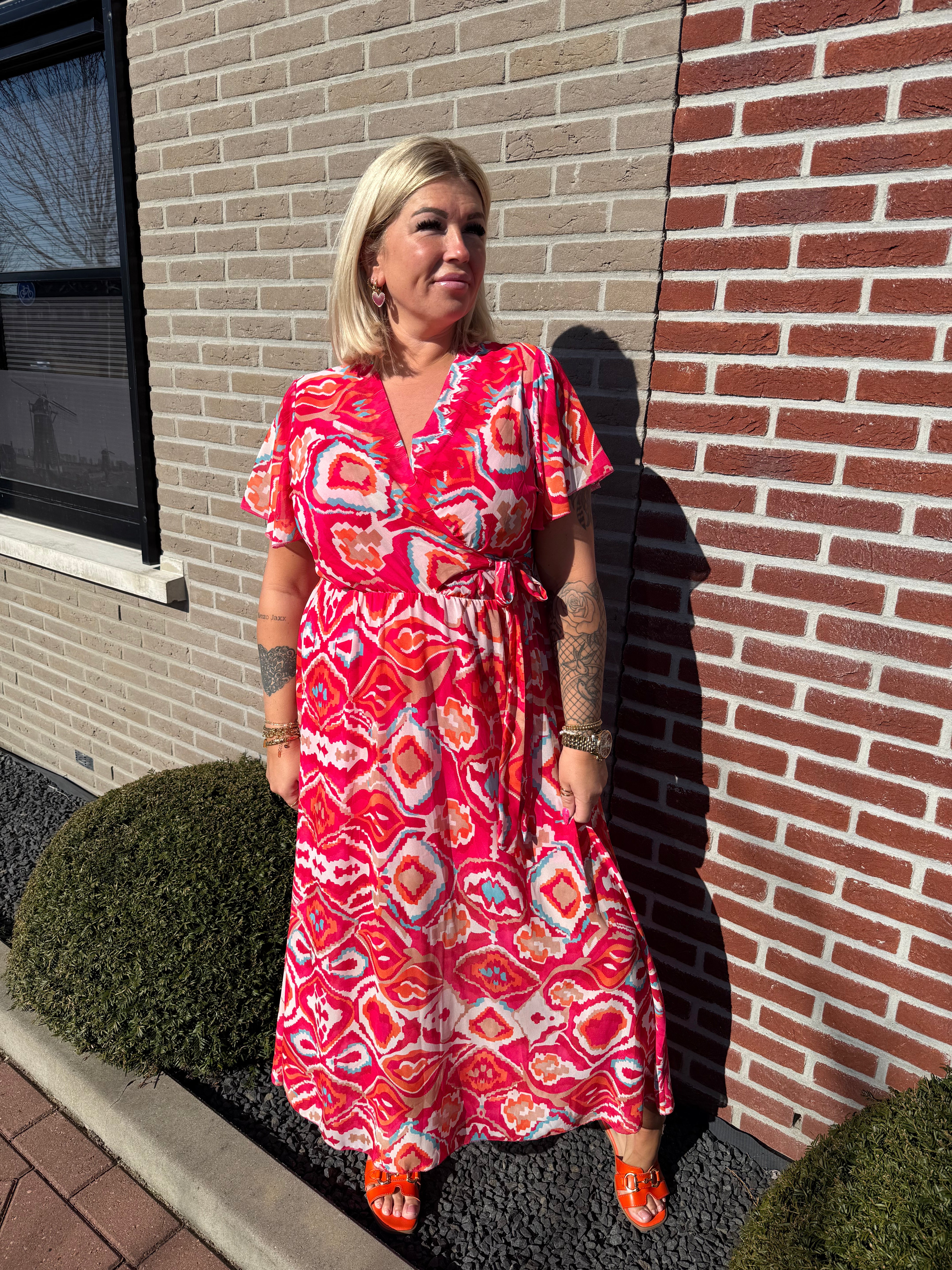 Maxi jurk met strik print wave patroon roze/rood
