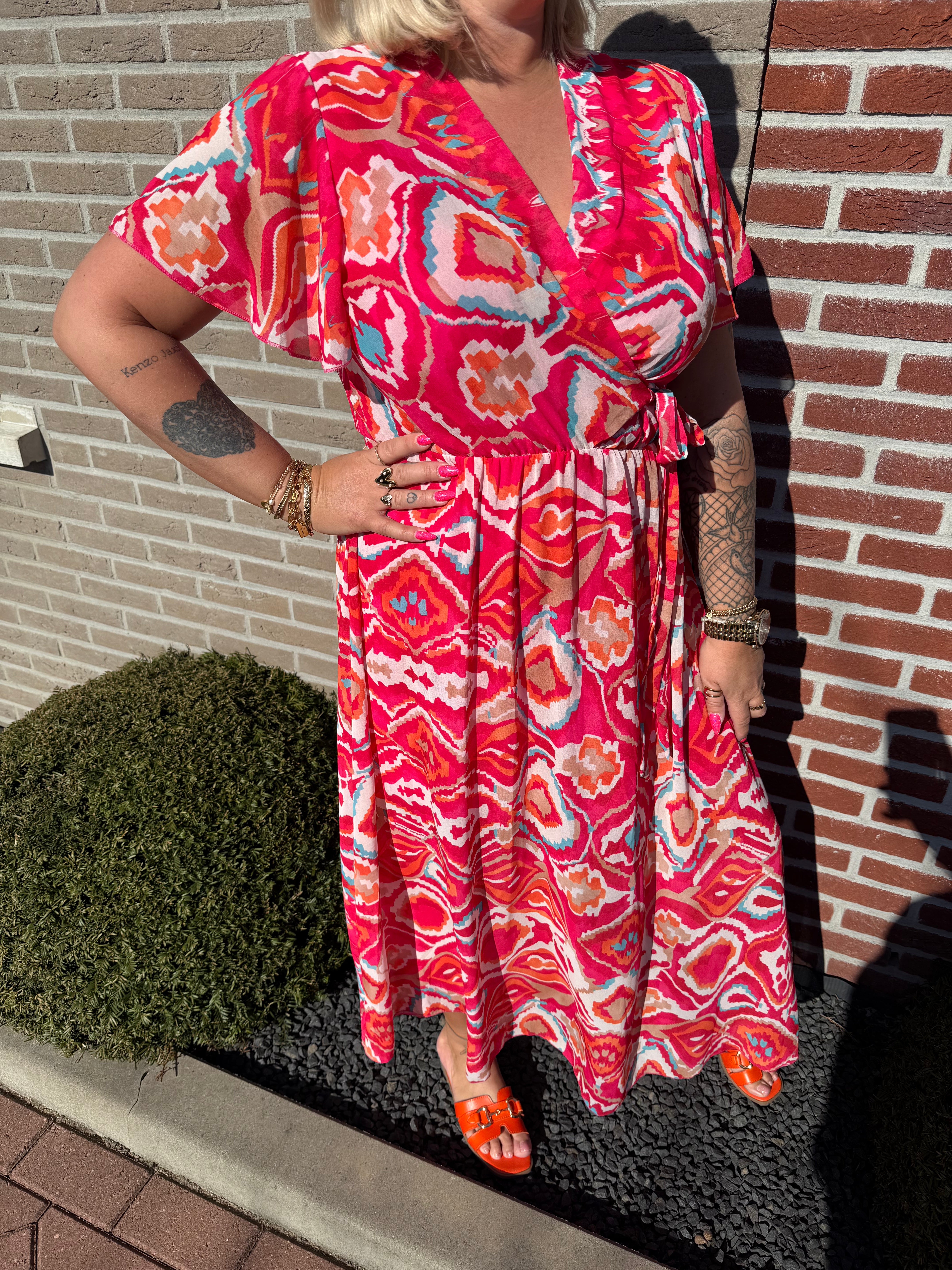 Maxi jurk met strik print wave patroon roze/rood