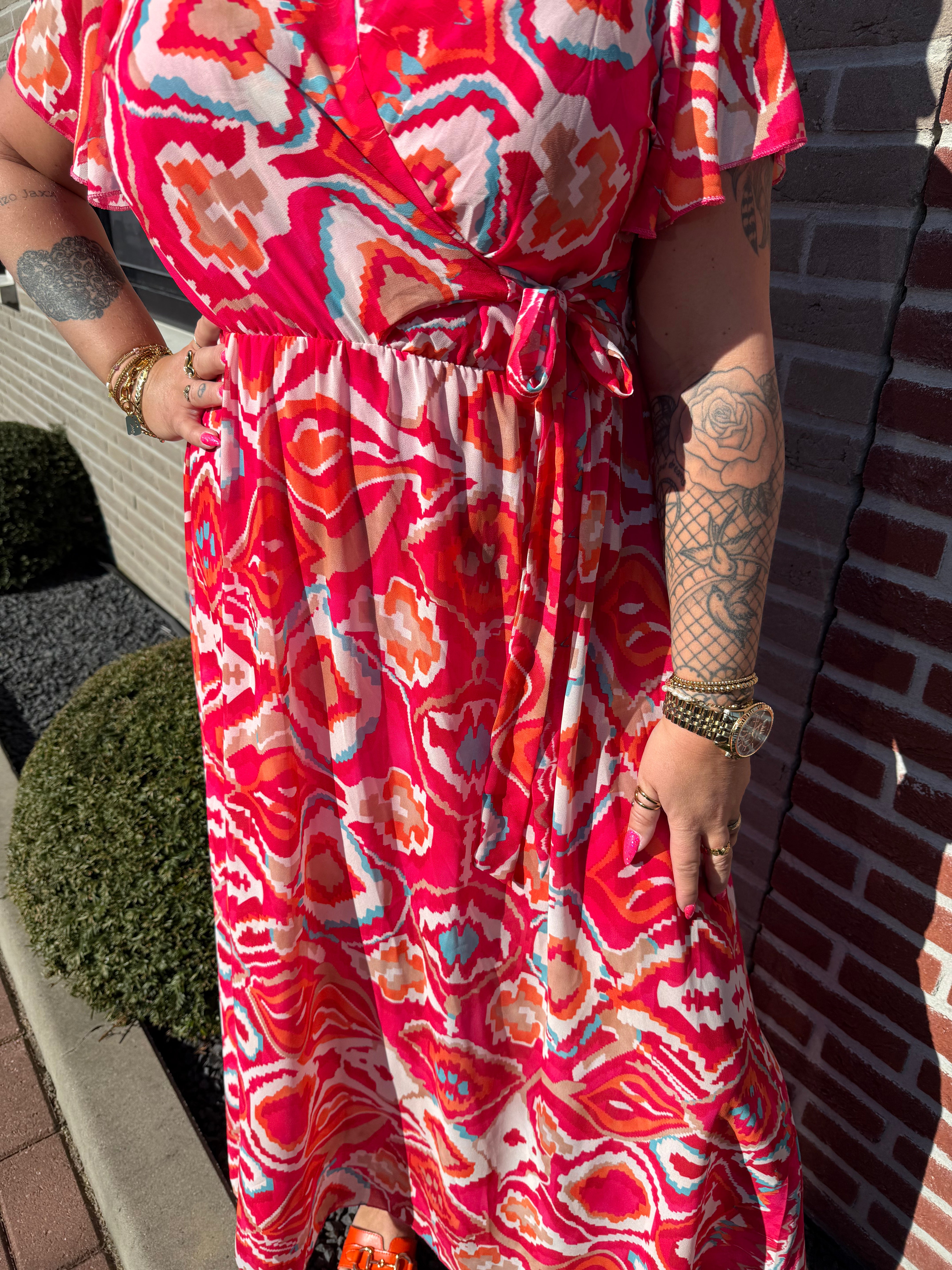 Maxi jurk met strik print wave patroon roze/rood