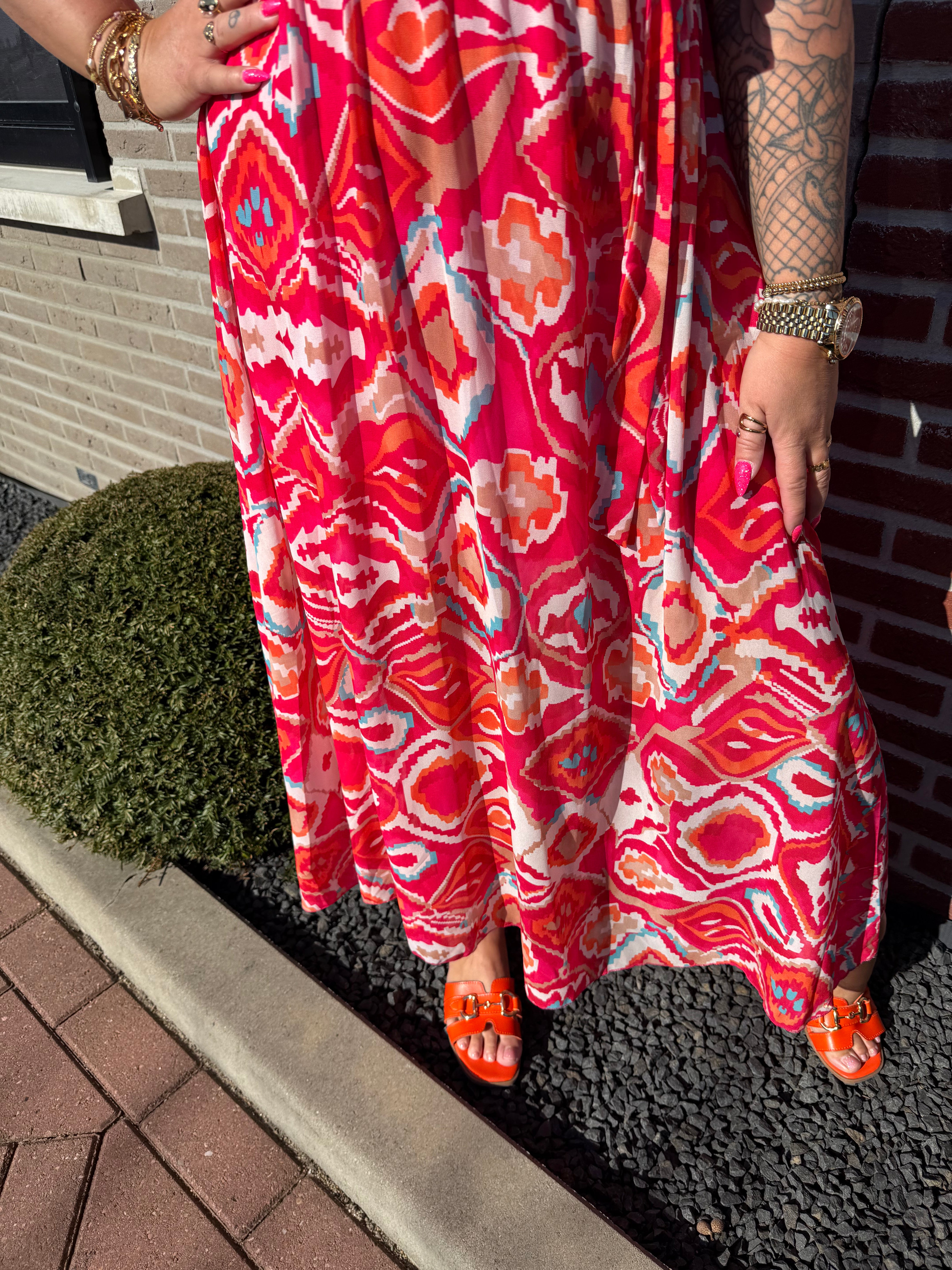 Maxi jurk met strik print wave patroon roze/rood